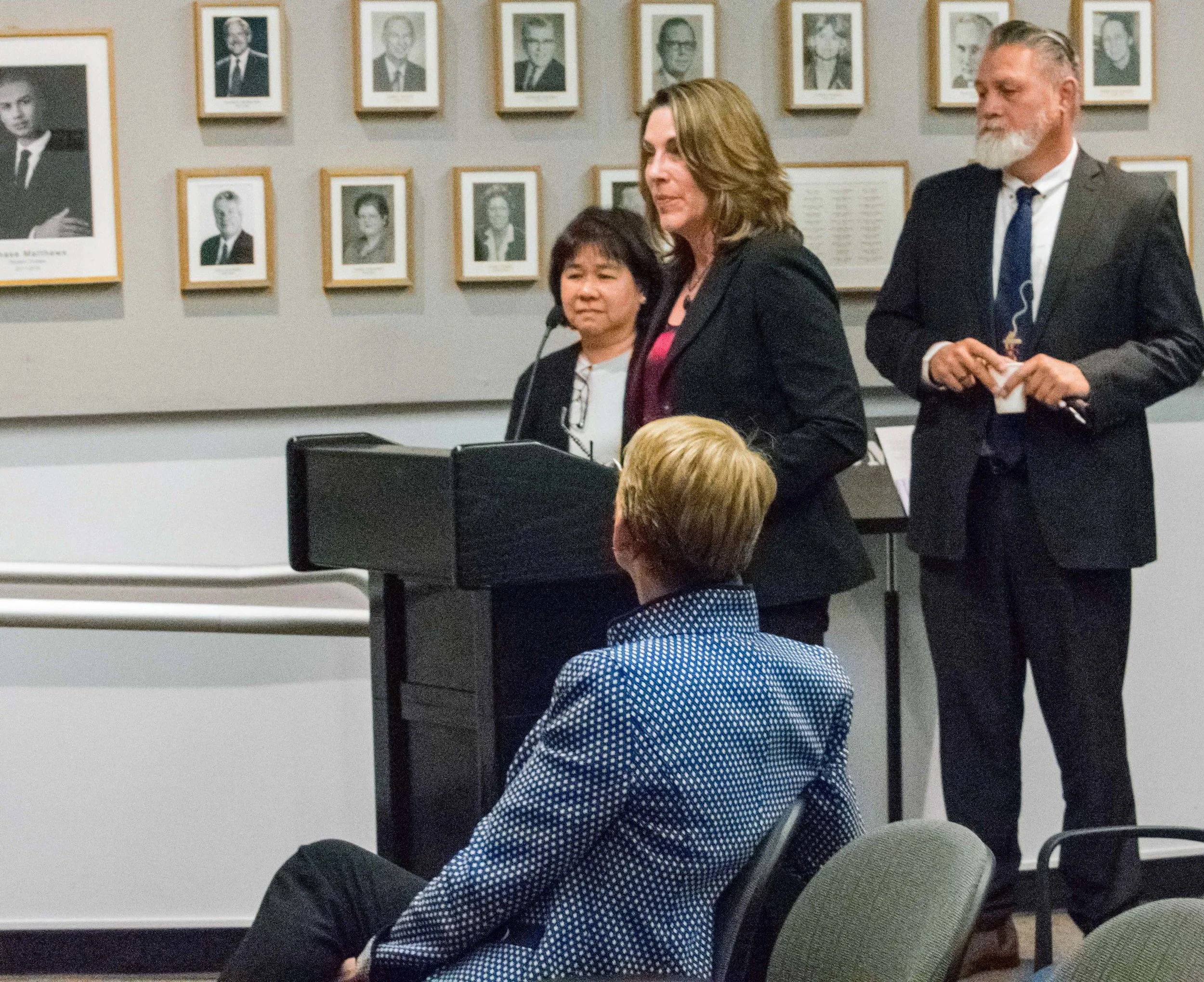 During the monthly Board of Trustees meeting, representatives of the Disabled Students Program and Services, pictured left to right are Faculty Coordinator Nathalie Laille(cx), Director Stephanie Schlatter, and Mike Tuitasi, Vice President of Student Affairs discuss how the center has been doing in recent months at Santa Monica College in Santa Monica, California on Tuesday, March 6, 2018. (Photo by Ethan Lauren/Corsair Staff)