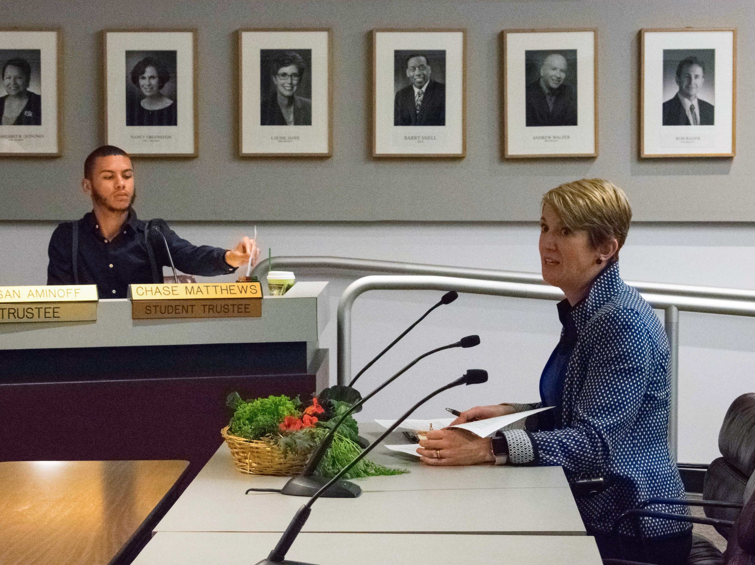  Georgia Lorenz, Vice President of Academic Affairs talks to the Board of Trustees during a monthly meeting, pictured is Student Trustee Chase Matthews about an update on the accreditation evaluation at Santa Monica College in Santa Monica, Californi