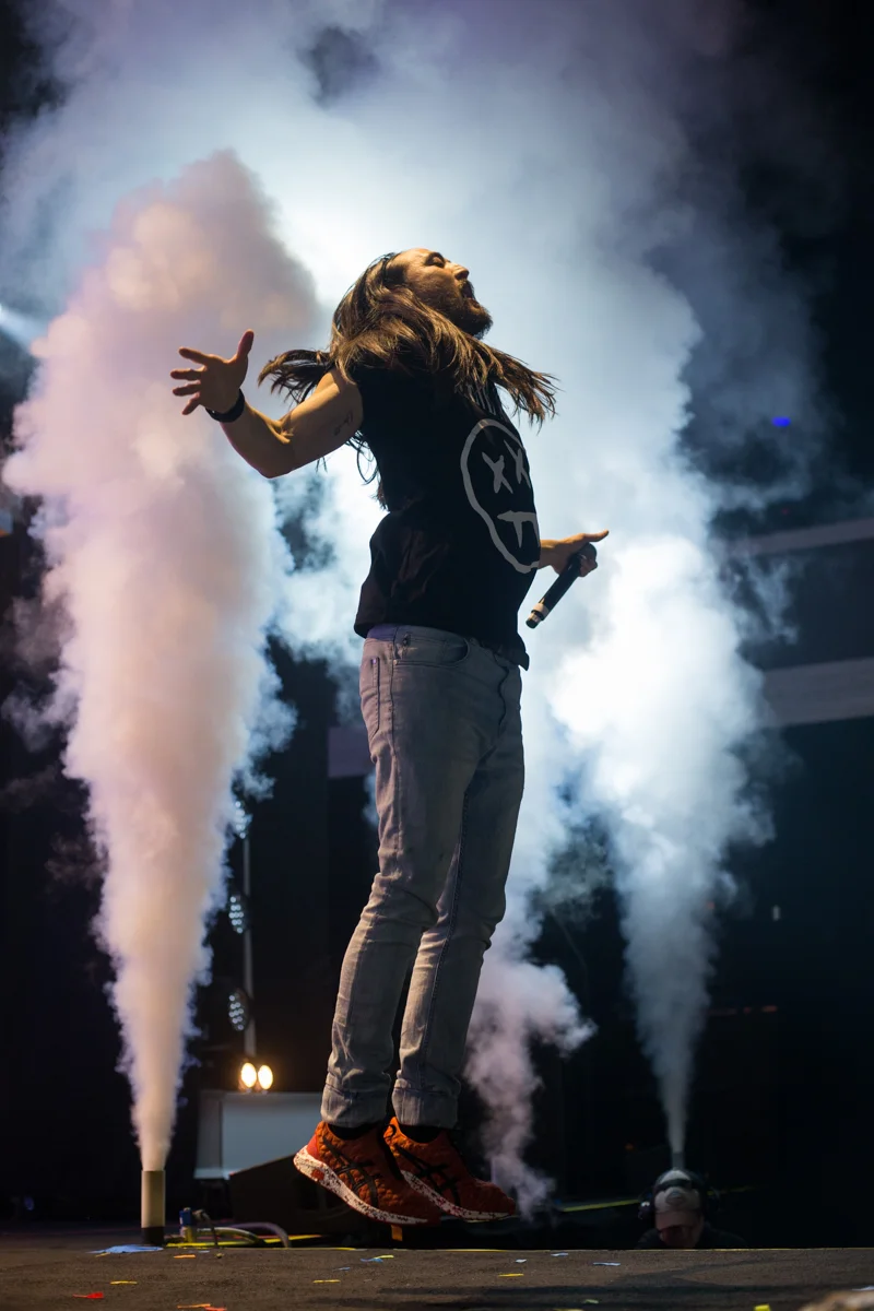 Electronic music artists and DJ Steve Aoki jumps up and down during his performance of "Boneless" at the Shrine Expo Hall and Auditorium in Downtown LA in Los Angeles, California on Friday, March 9th 2018. DJ Steve Aoki is currently on tour as part of his Kolony Tour. (Photo by: Thane Fernandes)