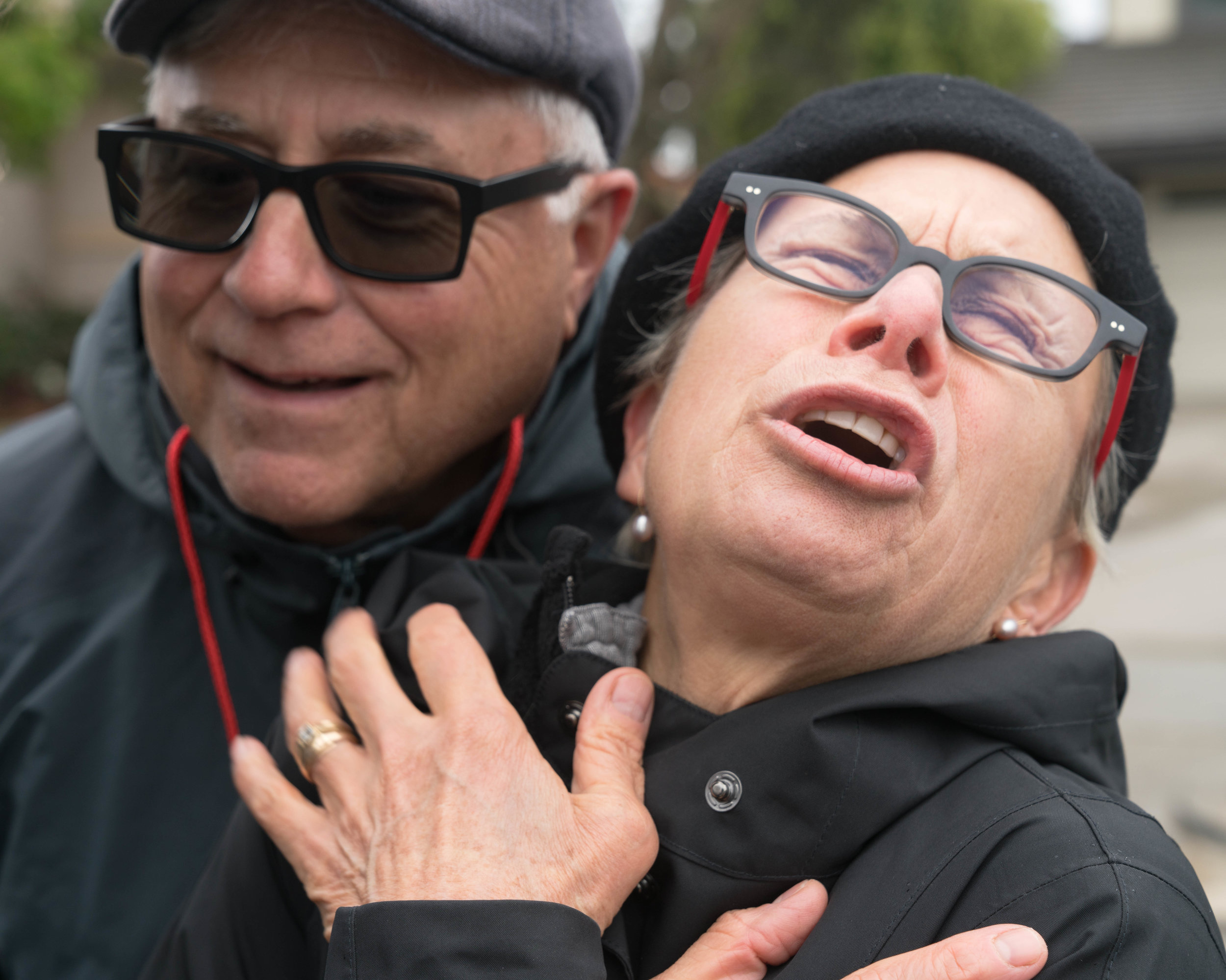 Kim Cheselka (right) and her husband Mitch Dubin (left) came to protest President Trump’s arrival in Santa Monica, California on Tuesday, March 13, 2018. Cheselka grimaced as she recalled seeing Trump wave at the crowd as he drove by in his motorcade. “I’m so grossed out,” Cheselka said. “You see him on TV, but to actually see him in person I had a visceral response and it was negative.” “You yelped,” her husband said. “You said you weren’t going to be able to sleep tonight.” (Helena Sung / Corsair Photo)