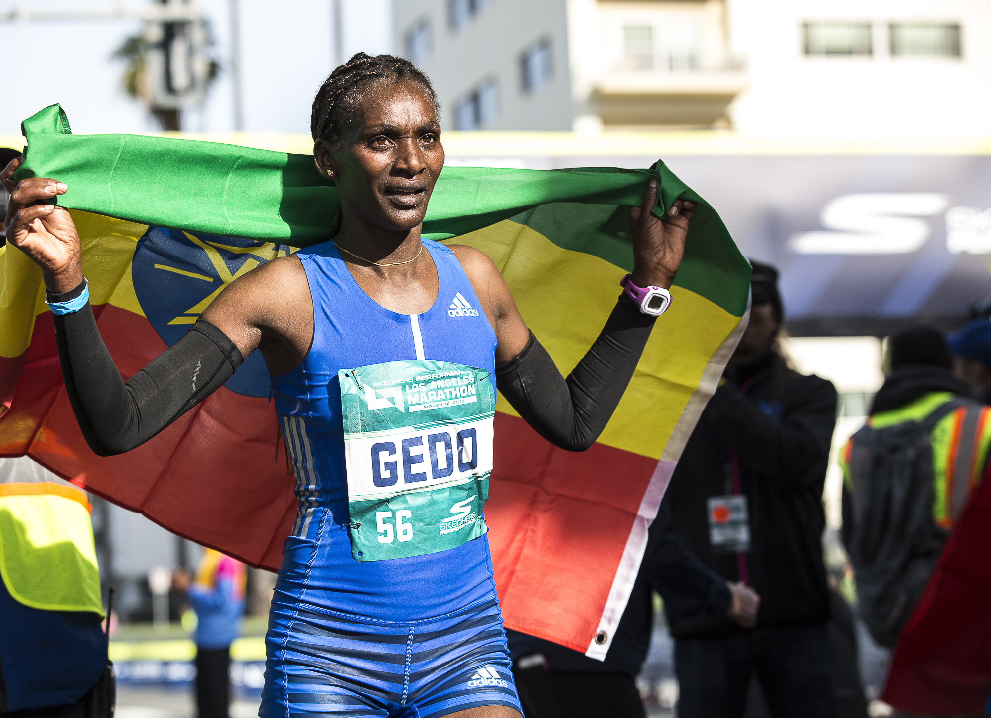  Sule Gedo, the first women to cross the finish line at 2:33:52, proudly holds the Ethiopian flag during the 33rd annual Los Angeles Marathon event on March 18, 2018 in Santa Monica, California. (Matthew Martin/Corsair Photo) 