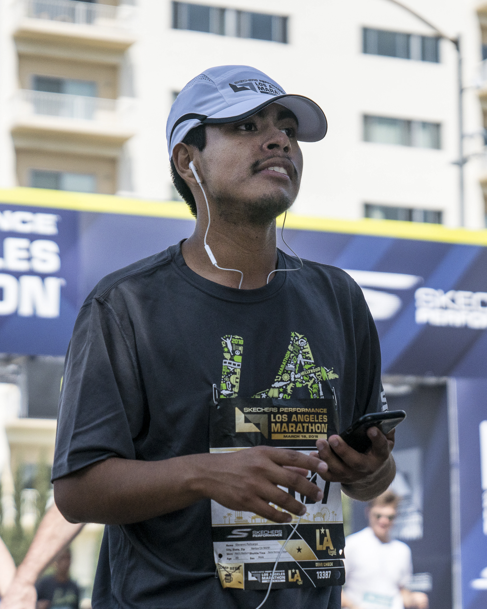  Giovanni Policarpo, an SMC student, just after crossing the finish line at the Los Angeles Marathon in Santa Monica, California on Sunday, March 18, 2018. This was Policarpo's third straight marathon. (Photo by: Helena Sung) 