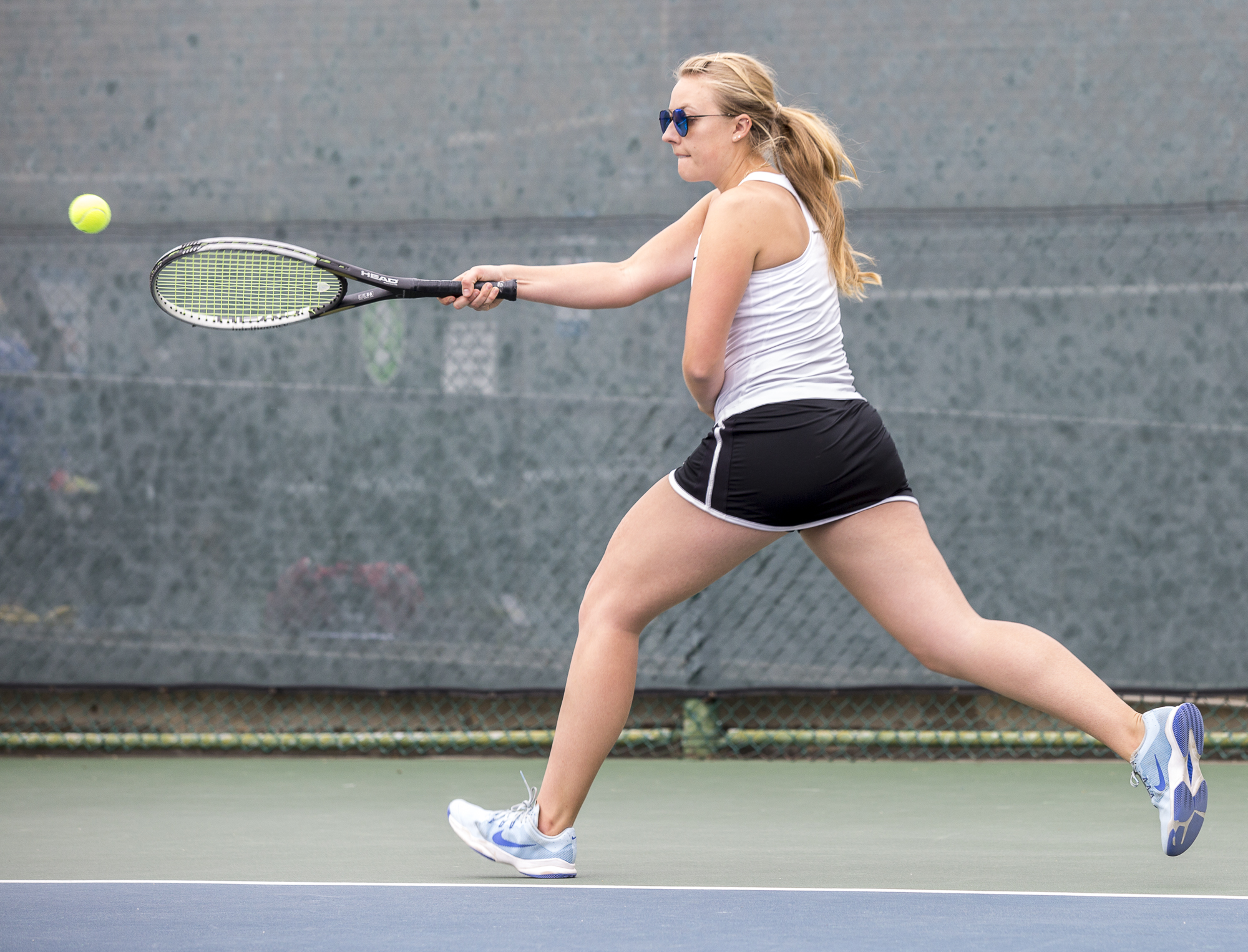 Santa Monica College Corsair Amanda Golling (#3, singles) prepares for a powerful, forehand swing against her Glendale City College Vaquero opponent at the Ocean View Park Tennis Courts in Santa Monica, California on Tuesday, March 20 2018. Golling would go on to lose both sets of her game, 0-2, adding to the Corsairs 0-7 loss against the Glendale College Vaqueros. (Matthew Martin/Corsair Photo)