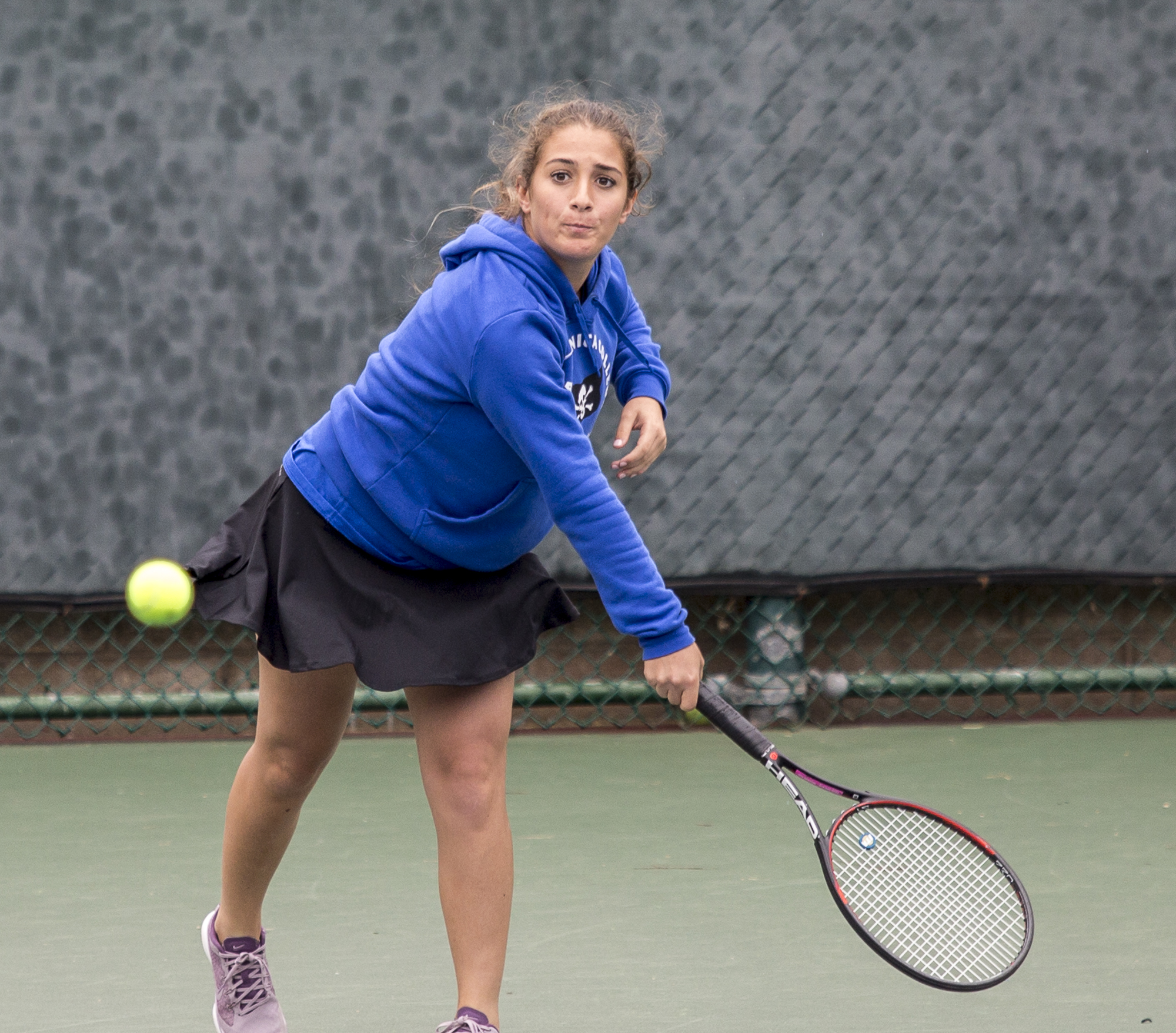  Santa Monica College Corsair freshman Mina Girit (#1, doubles) serves the ball conservatively during her doubles match against her Glendale City College Vaquero opponents consisting of sophomore Srna Lepchevska (cq) and sophomore Hailey McNall (cq) 