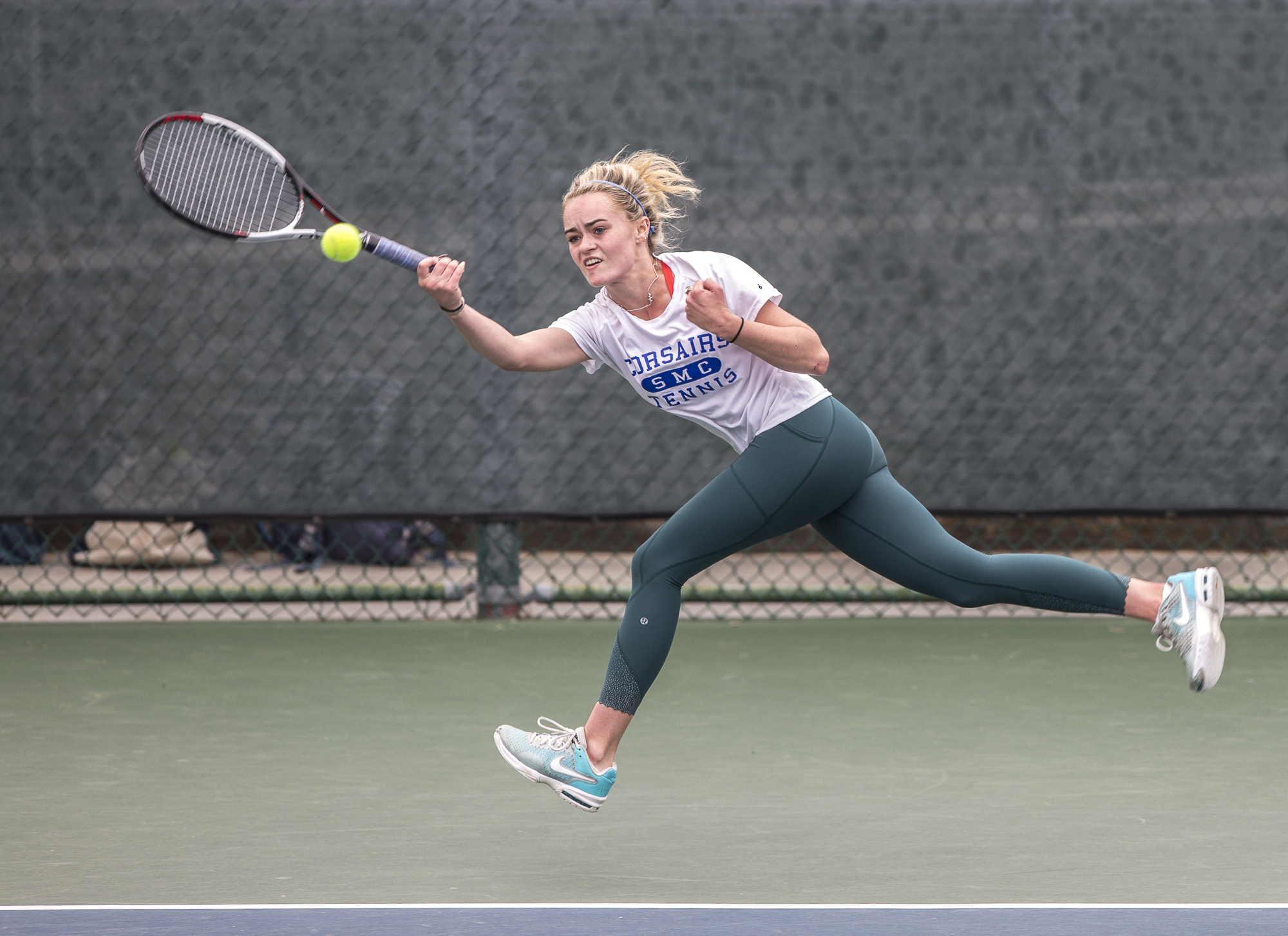  Santa Monica College Corsair sophomore Abby Mullins (#1, doubles) with great reach nails a powerful forehand strike during her doubles match against her Glendale City College Vaquero opponents consisting of sophomore Srna Lepchevska (cq) and sophomo