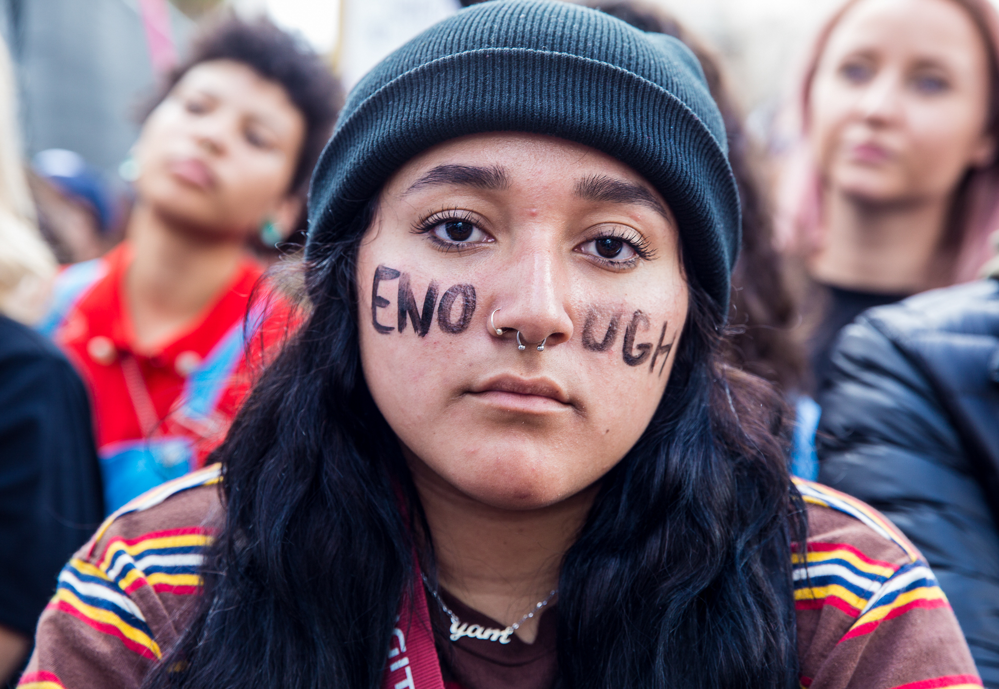  High School student Sabrinah Lopez, 17, attends the March for Our Lives protest with the words “enough” written across her cheeks, listening to key speakers voice their opinion on gun regulation in front of Los Angeles City Hall in Downtown Los Ange
