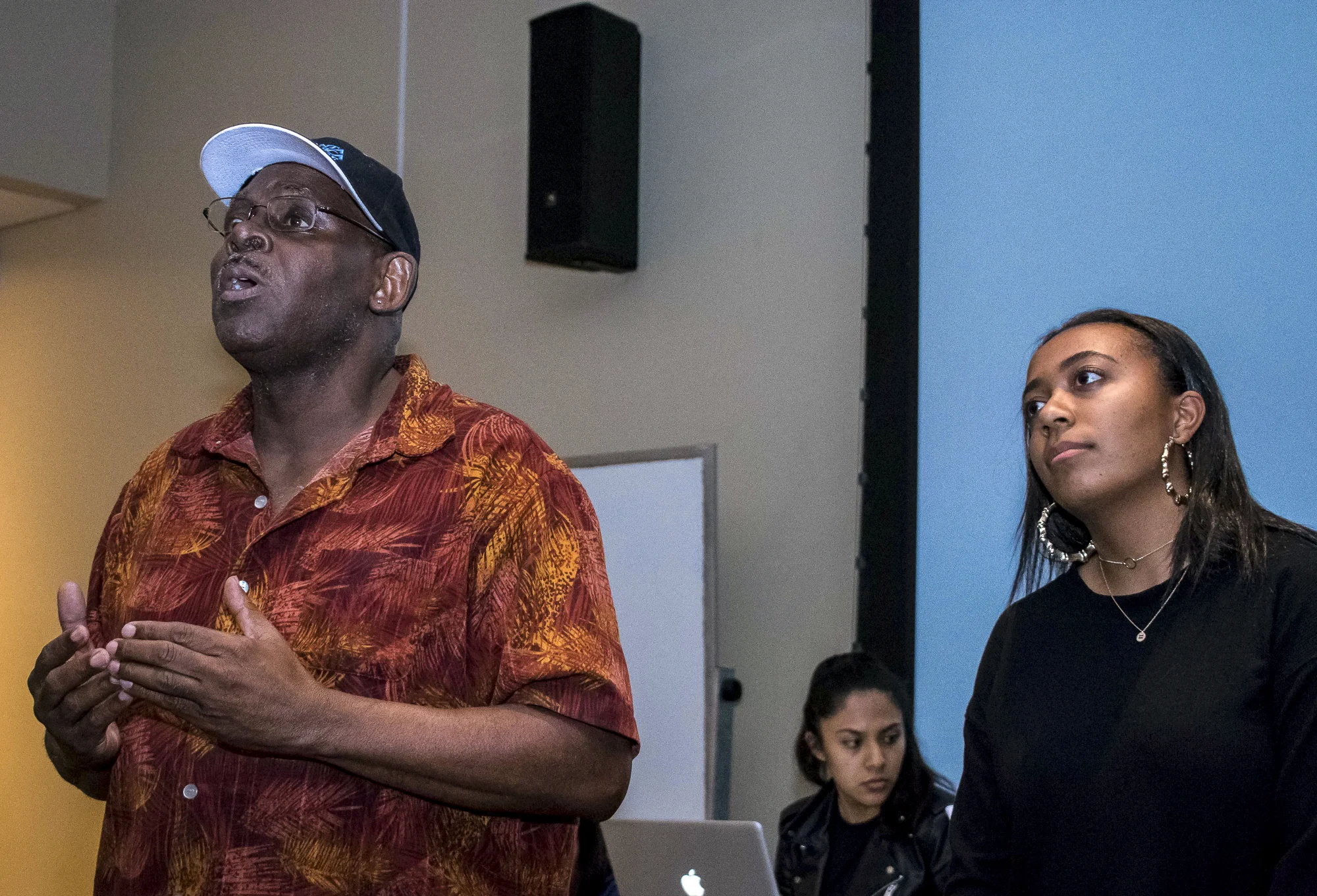 On Thursday, March 22, Benny Blaydes, a counselor, talks about the importance of consideration towards other cultures during an Inter-Club Council meeting at Santa Monica College regarding a motion to change the theme for a school event from Black Panther to something else while student Karlyn Hayes, president of the Black Collegian club looks on in Santa Monica, California. After the speakers were done, a vote was held, and the theme was changed to the more-encompassing ‘movies.’ (Ethan Lauren/Corsair Photo)