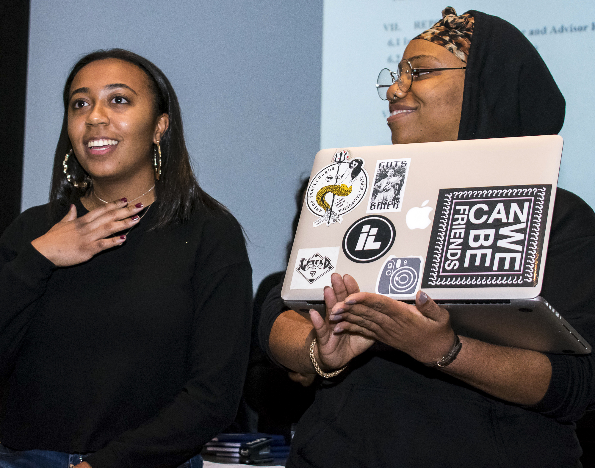  On Thursday, March 22, student Karlyn Hayes, left, president of the Black Collegian club, and Seprina Howard, director of activities for the club talk about the importance of consideration towards other cultures during an Inter-Club Council meeting 