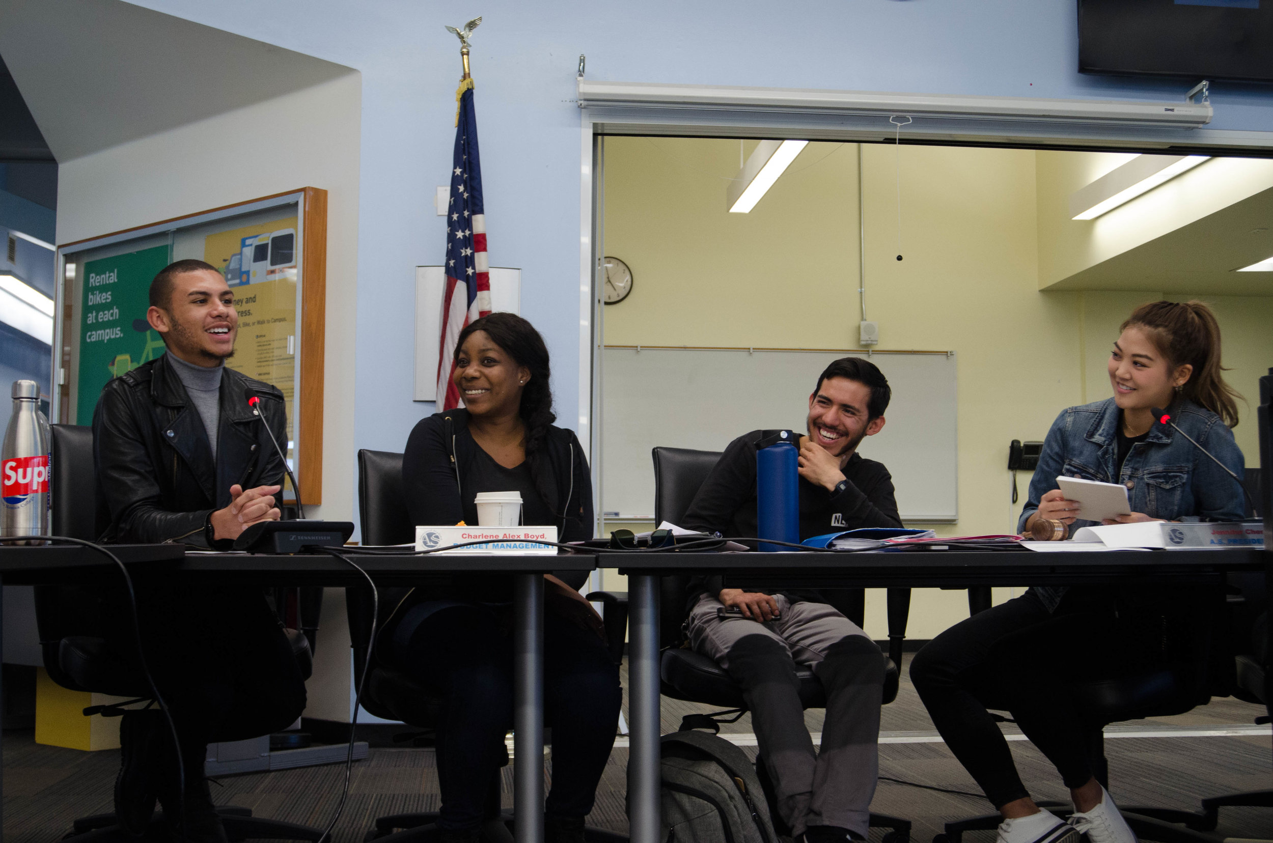 Associated Students President Jennifer Chen (far right) and Student Trustee Chase Matthews (far left) roleplay an interaction between a Congressman and an advocate, to the amusement of Director of Budget Management Charlene Alex Boyd (center left) and Vice President George Sandoval (center right) In the Associated Students' Center at Santa Monica College in Santa Monica, California. (Reed Curtis/Corsair Photo)Monica College in Santa Monica, California, Associated Students. (L-R) President Jennifer Chen, Faculty Advisor Dr. Nancy Grass, Director of Student Assistance Ana Laura Paiva, Director of Publicity Stephanie Hernandez, Director of Activities Saori Gurung, Director of Student Advovacy Santiago Guerrero, Director of Budget Managment Charlene Alex Boyd, A.S. Vice President Geoge Sandoval, Student Trustee Chase Matthews, and Director of Student Outreach Max Gong. (Reed Curtis/Corsair Photo)
