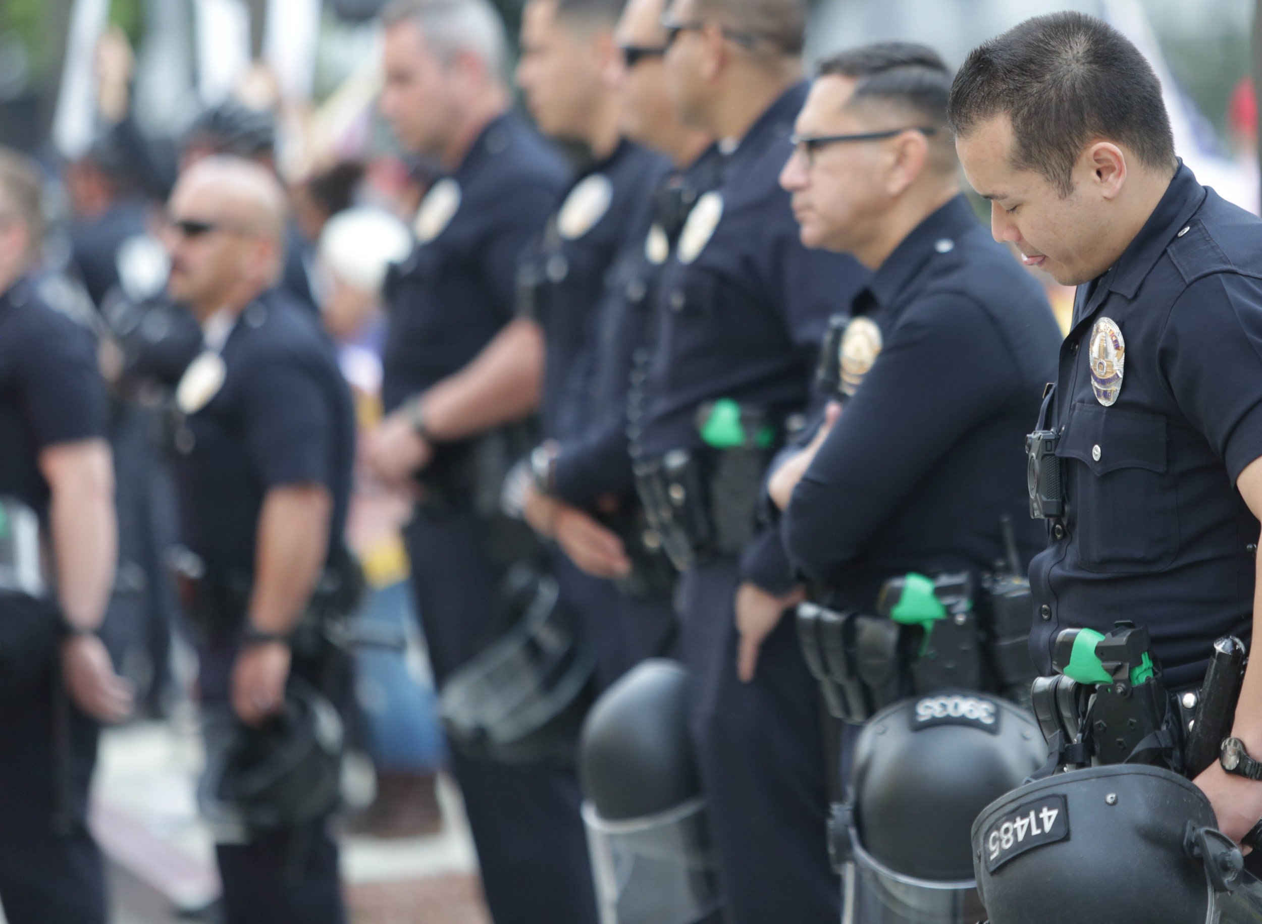  Police line up prepared for the worst seperating protesters and counter protesters on either side of them. Crowds gathered to support their respective belief at the March for Life in Downtown Los Angeles, California. The Demonstration took place on 
