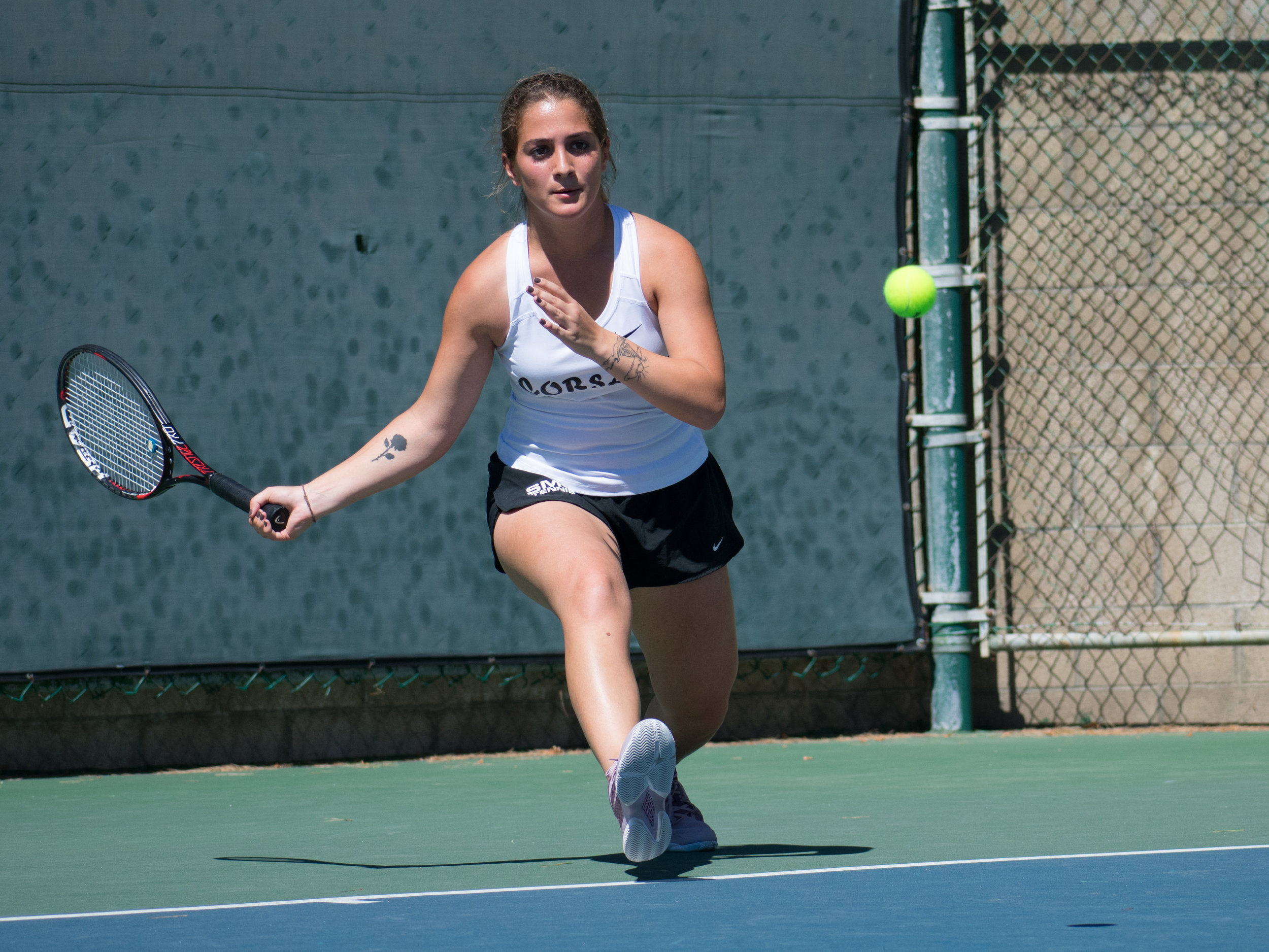  Mina Girit, Santa Monica Corsair hits a forehand during a match against Victor Valley Rams Ava Andrasi on a home game at the Ocean View Park Tennis Courts in Santa Monica, California. Girit won the match with sets of 6-0 and 6-2, helping the Corsair