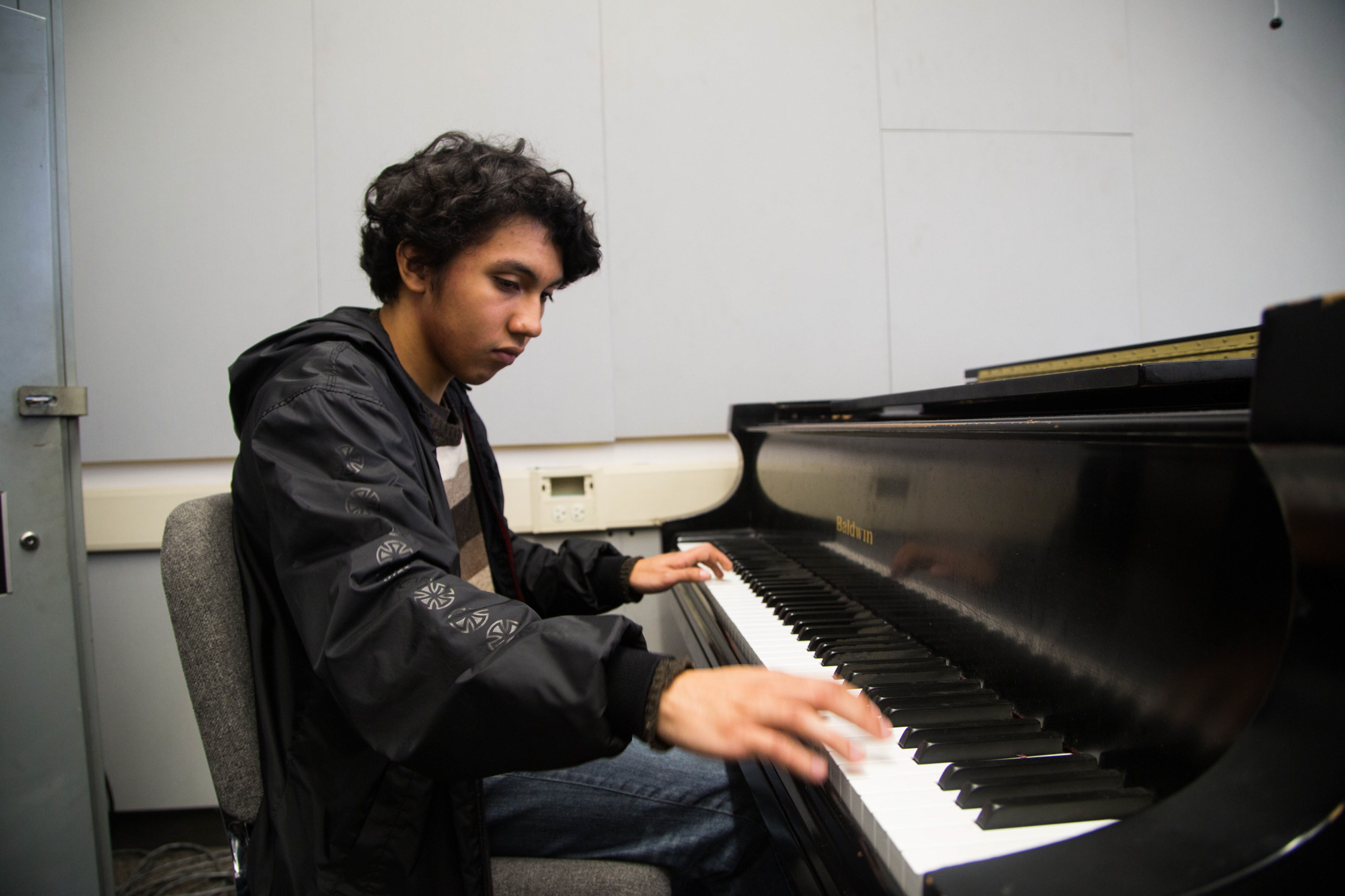 Club member Gary Galeas rehearsing a song during club meeting, Thursday, March 22, 2018, at Santa Monica College's Performance Arts Center in Santa Monica, California (Zeynep Abes/ Corsair Photo)