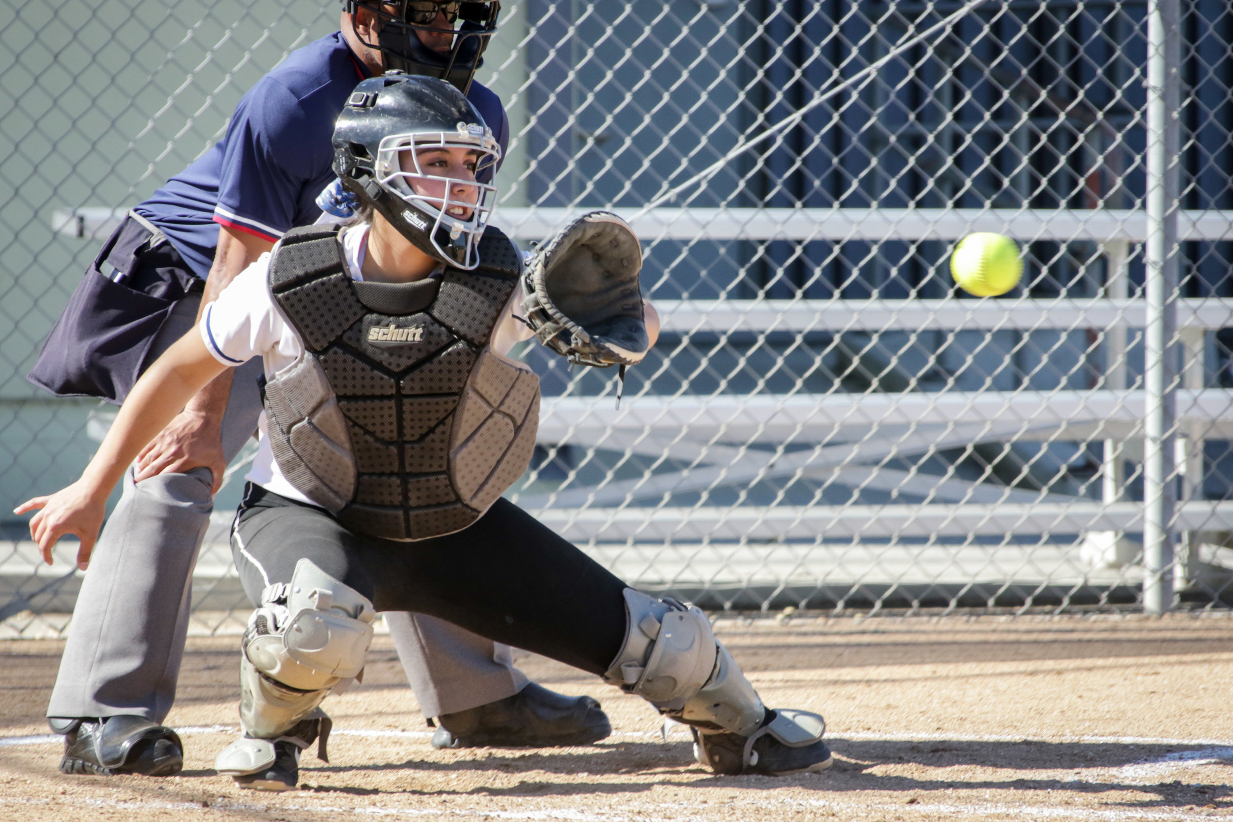  Santa Monica College Corsair softball team catcher Sam Soto (Right) attempts to catch a strike ball during their game against Allan Hancock College on Tuesday, March 27th, 2018. The game ended 8-1 in favor for Allan Hancock College. (Santa Monica, C