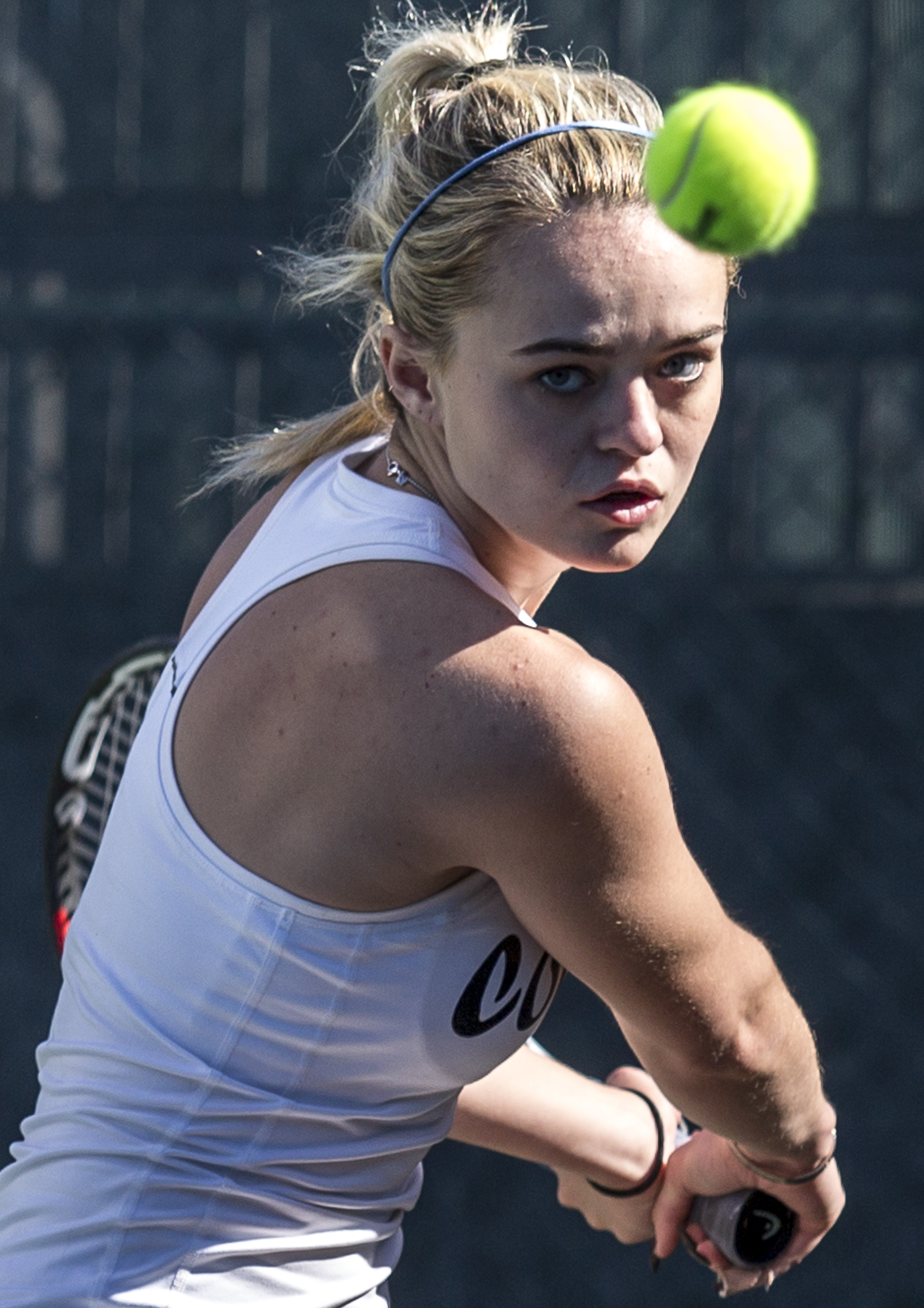 Santa Monica College Corsair sophomore Abby Mullins (#1, singles) prepares to hit a powerful, backhand slice against her Victor Valley College opponent Ally Samp at the Ocean View Park Tennis Courts in Santa Monica, California on Tuesday, March 27 2