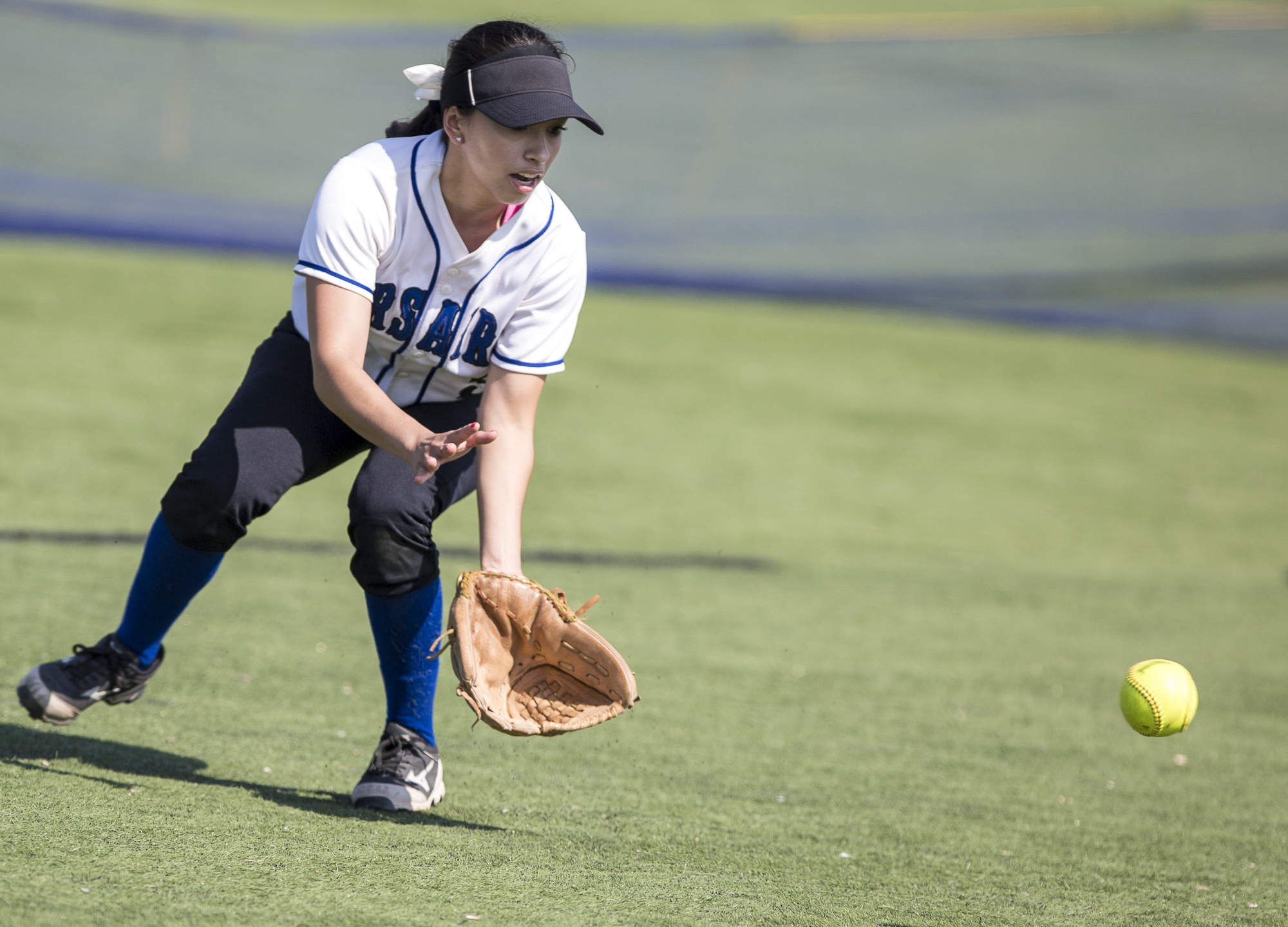 Santa Monica College Corsair freshman out-fielder Ashley Nava prepares to field the ball and throw it towards 2nd base at the bottom of the 3rd at the John Adams Middle School field in Santa Monica California, on Tuesday, April 3 2018. The Santa Mon