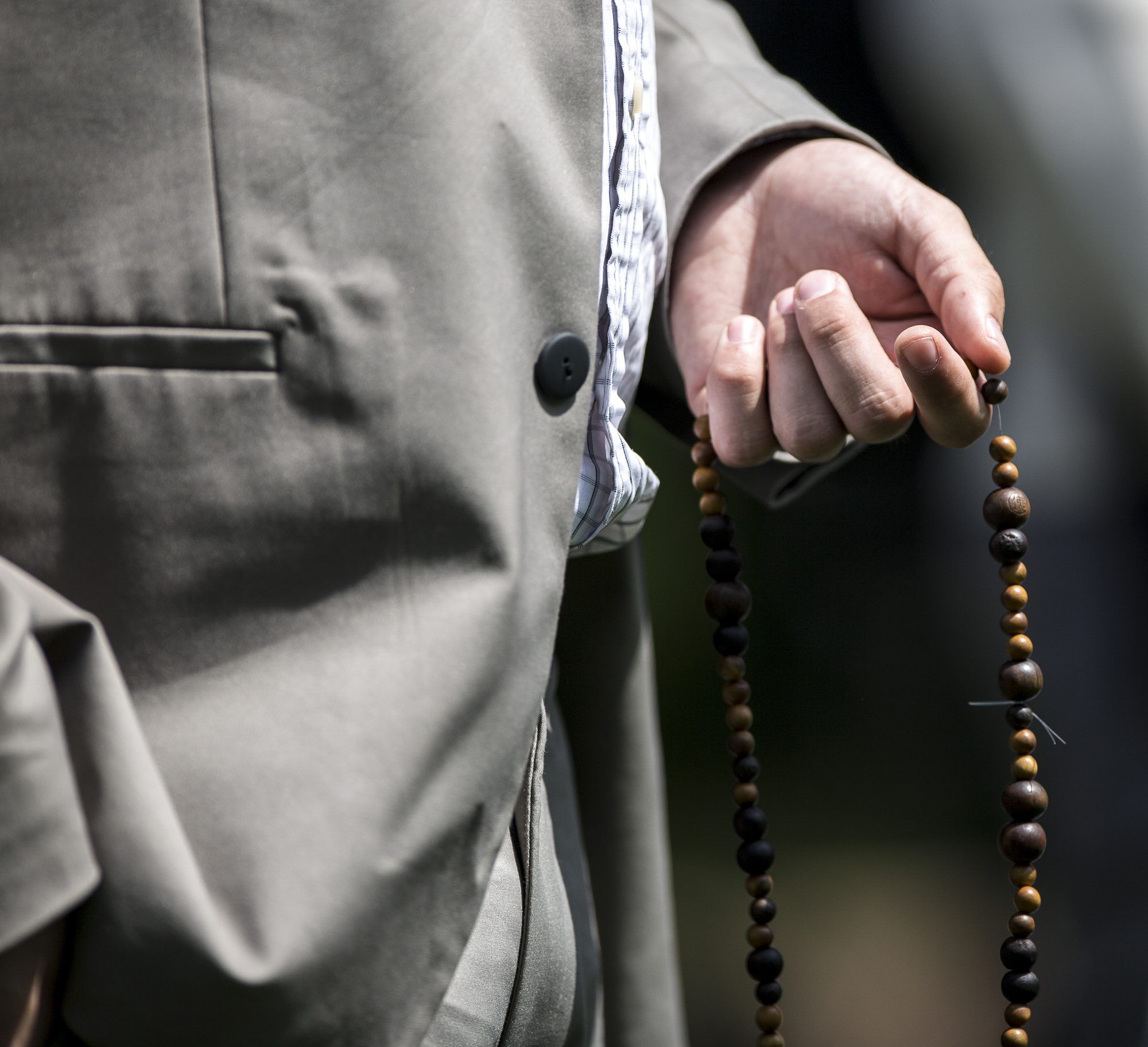 Santa Monica College Associated Student Board (A.S) Student Trustee candidate Ben Kolodny spins a necklace of beads through his finger tips during the A.S election debate on the quad of the Santa Monica College main campus in Santa Monica California, on Tuesday, April 3, 2018.(Matthew Martin/Corsair Photo)