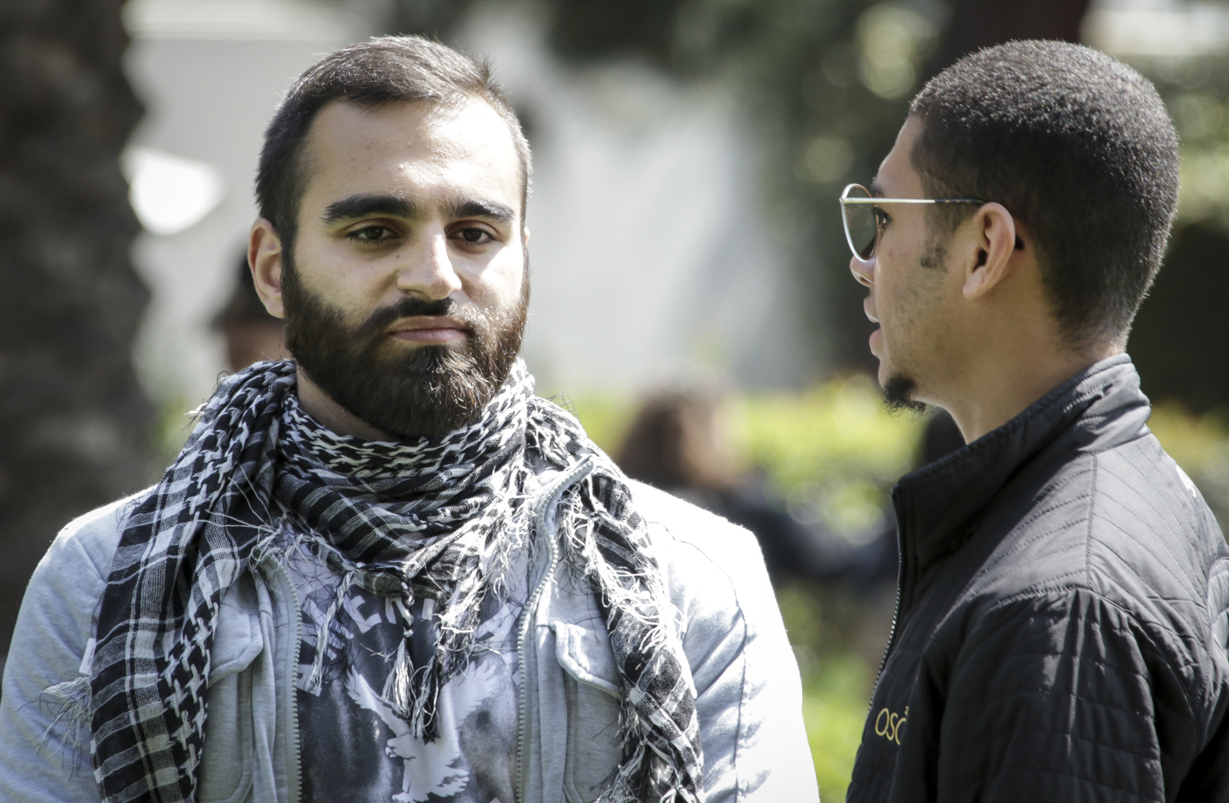 Santa Monica College Associated Students Candidate Hesham Jarmakani (Left) and Chase Matthews (Right) at the Associates Students election debate held at the quad of the main campus. Jarmakani is running for the position of the vice president. Chase Matthews is currently Student Trustee. Santa Monica, California, Tuesday April 3, 2018. (Ashutosh Bikram Singh/Corsair Photo)