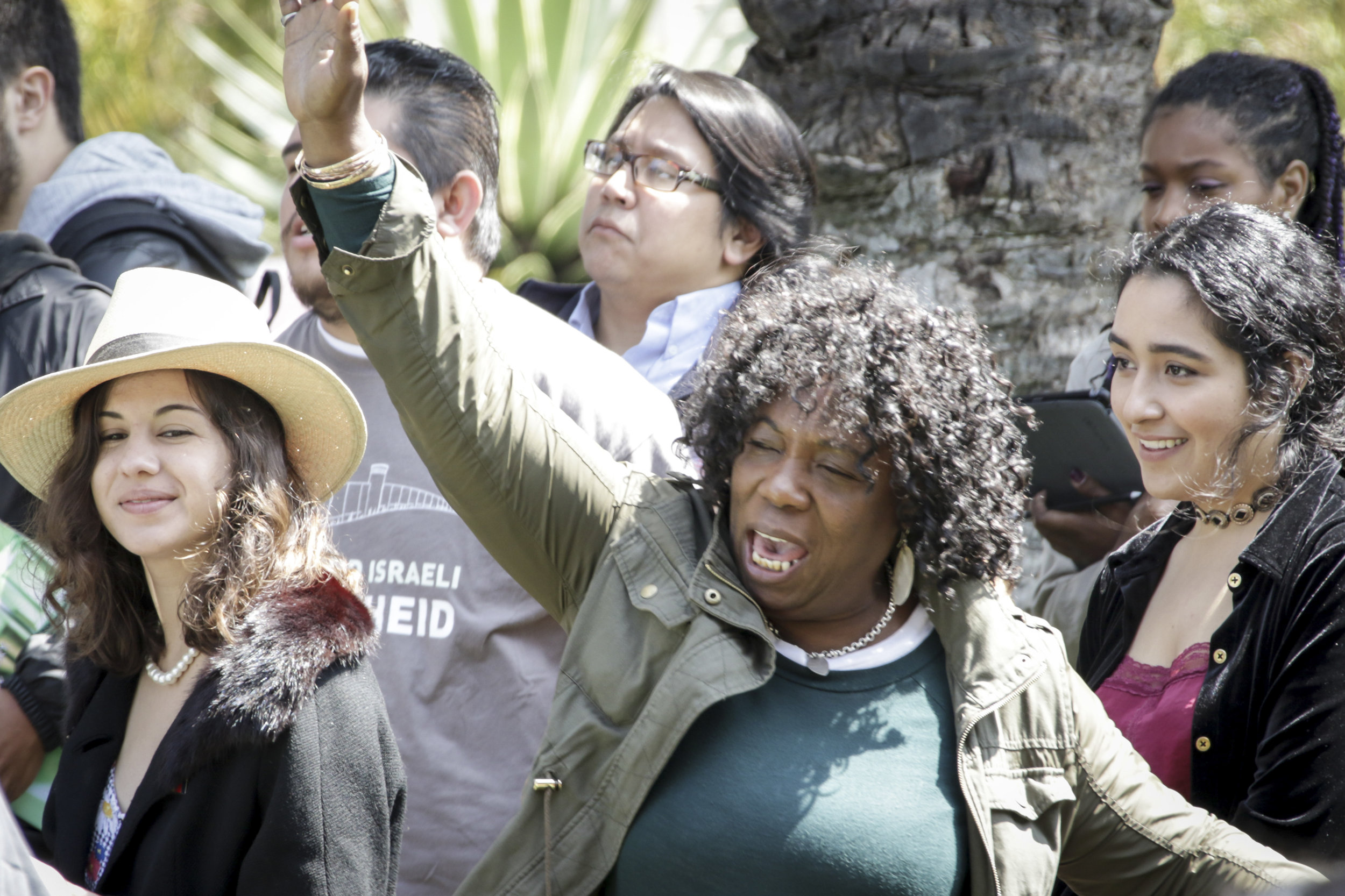  Santa Monica College student Hyacinth Mcleod (Middle) cheers as the candidates deliver their speeches while at the Associated Students elections debate held at the quad of the main campus on Tuesday April 3, 2018. (Santa Monica, California, Tuesday 