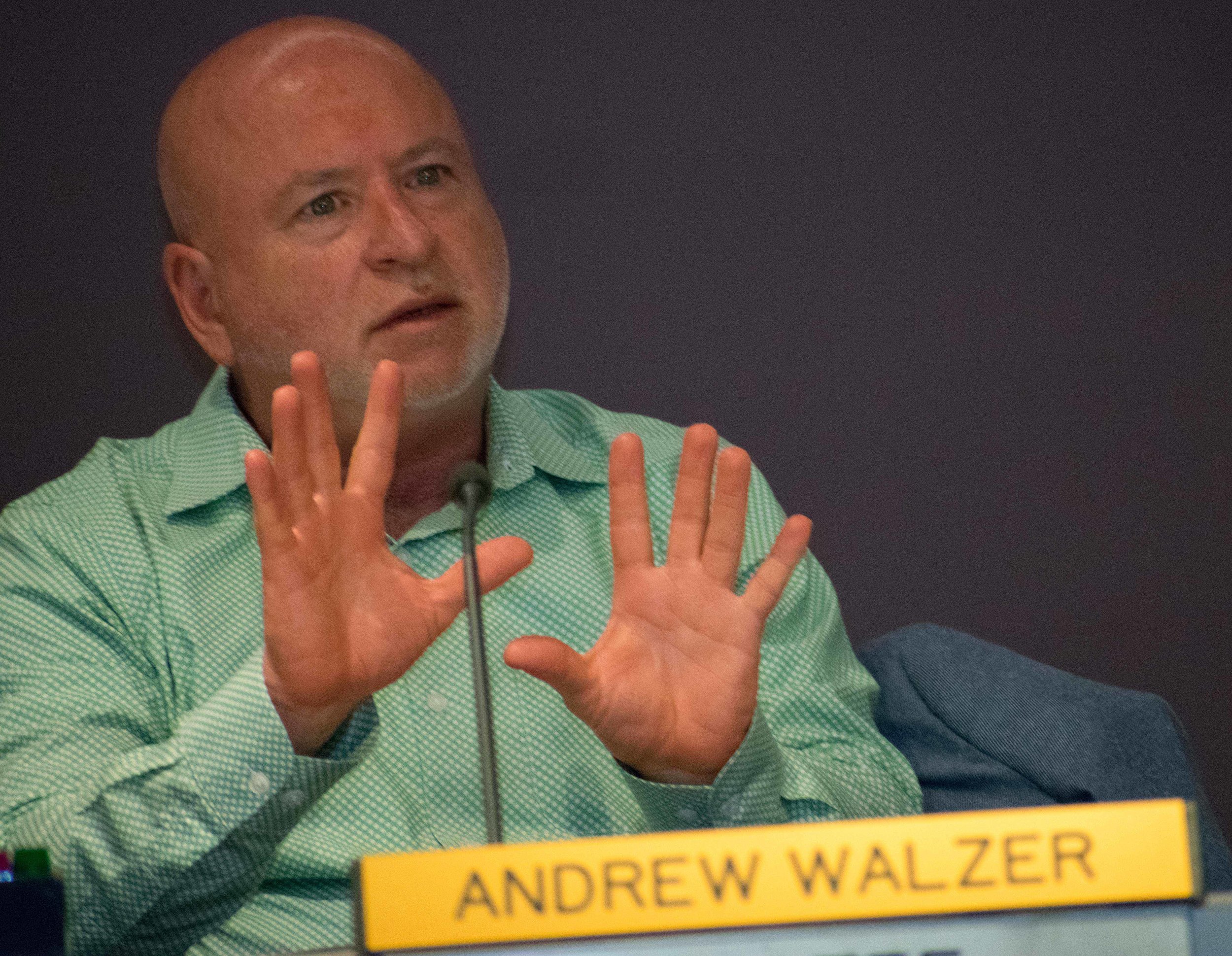  Trustee Dr. Andrew Walzer sits alongside the Santa Monica College board of trustees (not pictured) on Tuesday, April 3 during the monthly meetings at Santa Monica, California. Walzer is addressing the board about his view on a contract for an automa