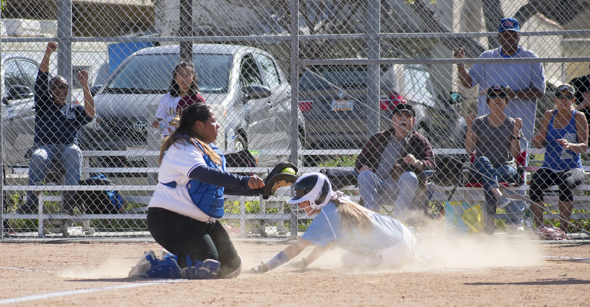 Moorpark College Raiders Lexi Brown (#4) fails to finish a run against the Santa Monica Corsairs during a softball game on Tuesday, April 10 at the John Adams Middle School Field in Santa Monica, California. The game ended with an 11-8 loss for the Corsairs, further continuing their six-game loss. (Ethan Lauren/Corsair Photo)