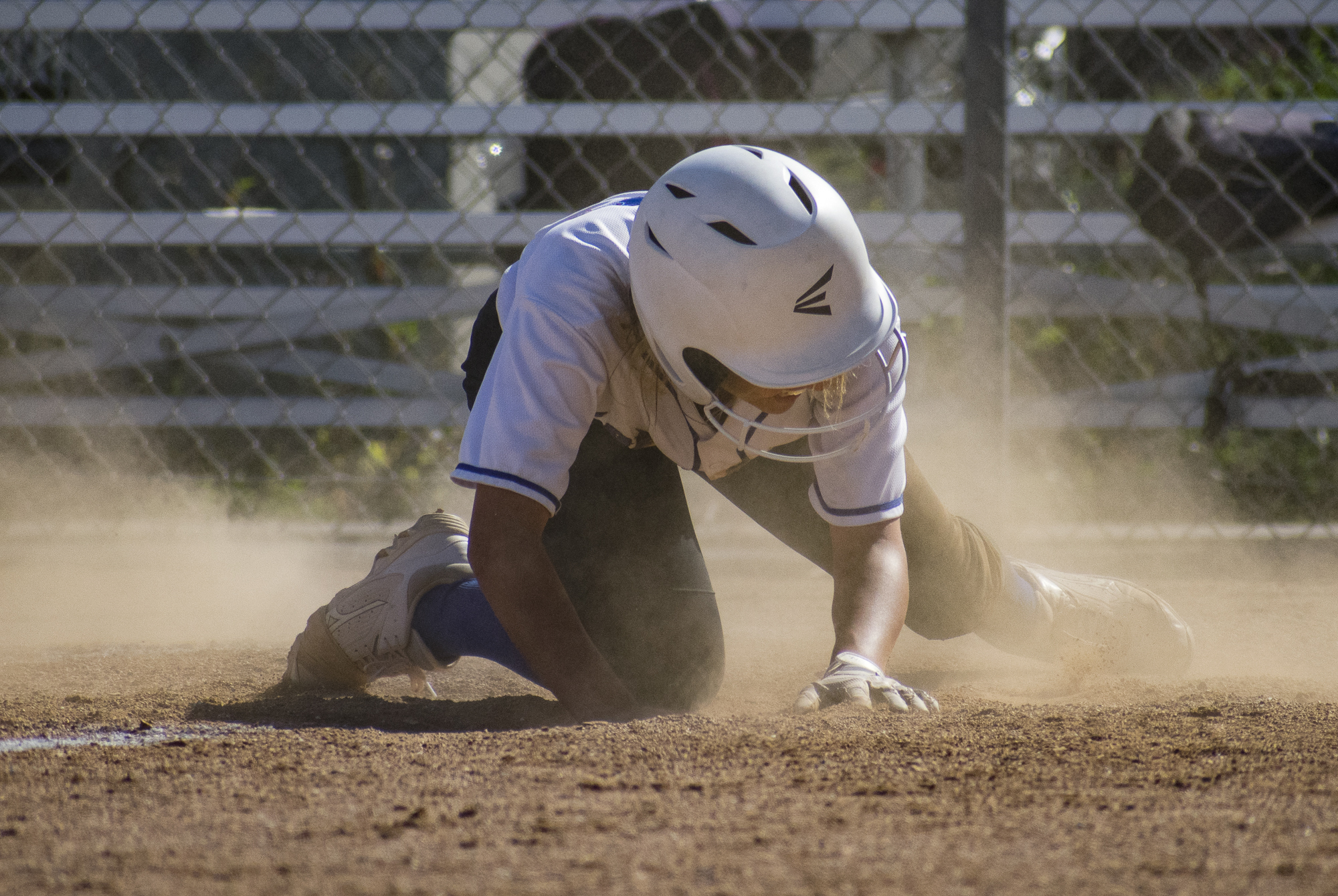 Santa Monica Corsairs Taylor Liebesman (#23) fails to finish a run despite sliding during a softball game against the Moorpark College Raiders on Tuesday, April 10 at the John Adams Middle School Field in Santa Monica, California. The game ended with an 11-8 loss for the Corsairs, further continuing their six-game loss. (Ethan Lauren/Corsair Photo)