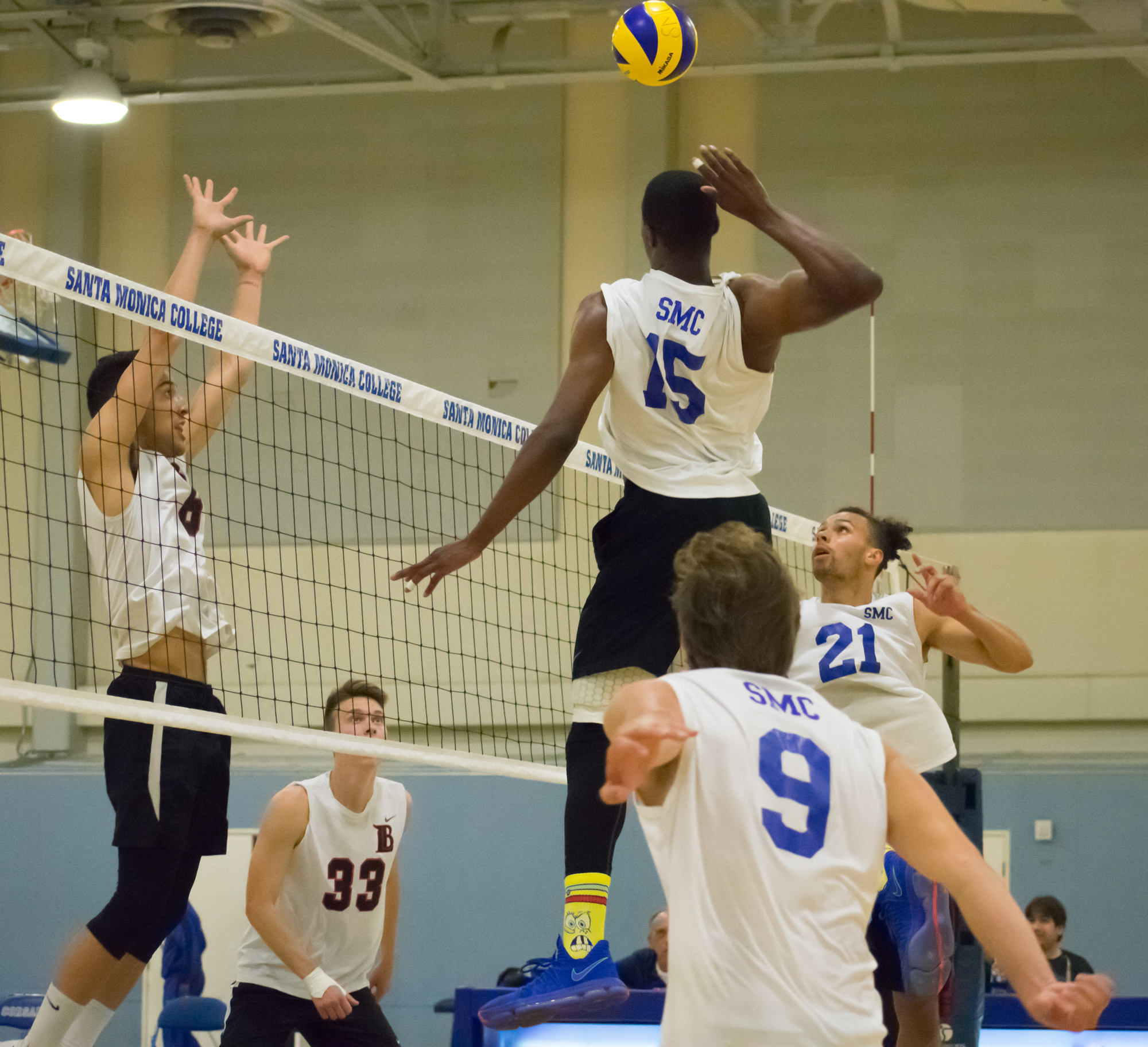 Santa Monica Corsairs sophomore and middle hitter Vecas Lewin (#15) prepares to spike the ball against the Long Beach City College Vikings during their final home game of the season on Wednesday, April 12, 2018 in the Santa Monica College gym at Santa Monica, California. The game ended in a 3-1 loss for the Corsairs, giving them a 7-7 overall rating for the season with one game left. (Ethan Lauren/Corsair Photo)