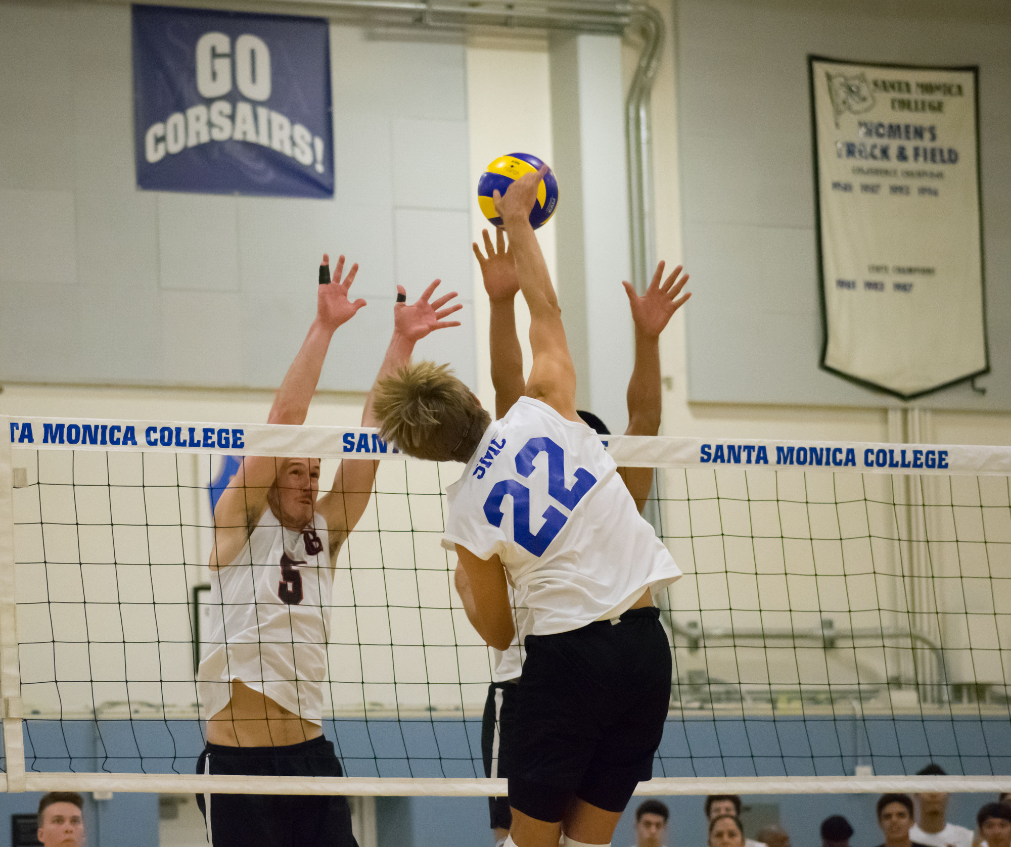  Santa Monica Corsairs sophomore and outside hitter Stanton Smith (#22) spikes the ball against the Long Beach City College Vikings during their final home game of the season on Wednesday, April 12, 2018 in the Santa Monica College gym at Santa Monic