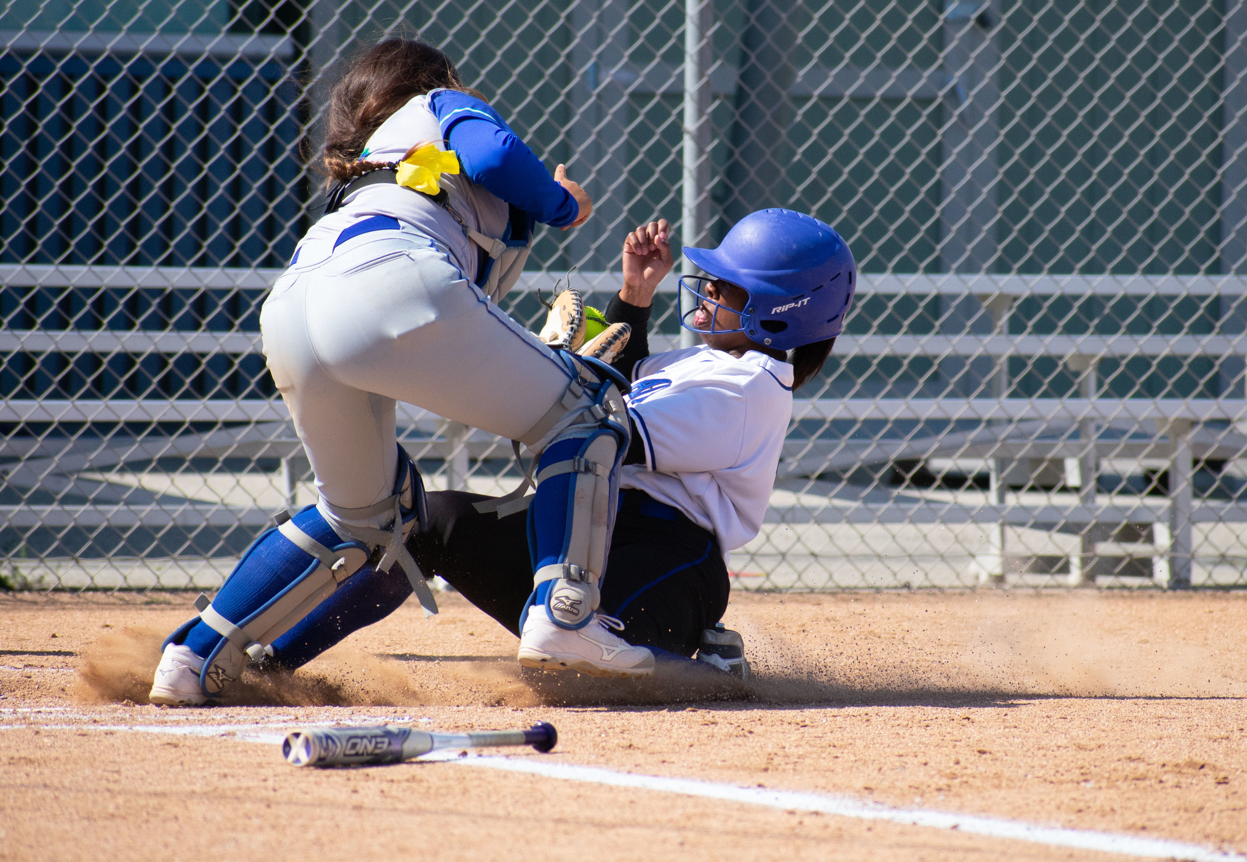 Santa Monica College Corsair Kahlaysia Miller (#8) fails to make it home in a softball game against the Oxnard Condors on Thursday, April 19, 2018 at the John Adams Middle School Field in Santa Monica, California. The game ended with an 3-2 win for the Corsairs, breaking a seven-game losing streak on their penultimate game of the season. (Ethan Lauren/Corsair Photo)