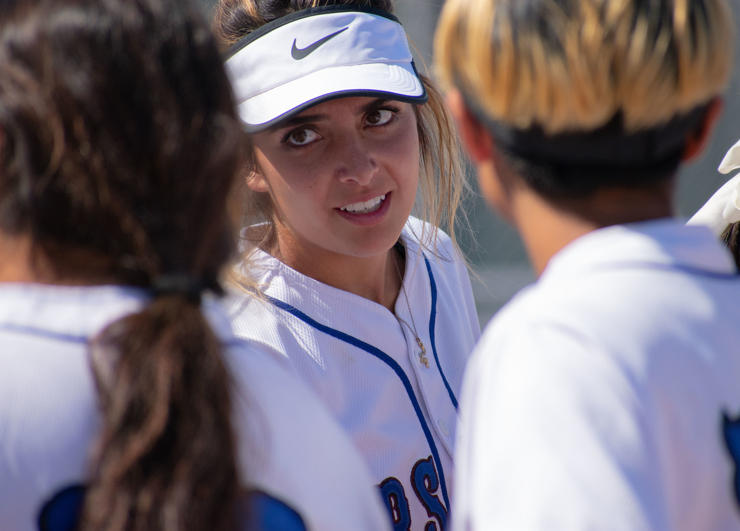  Santa Monica College Corsair Taylor Liebesman (#23) talks with several players on the field during the sixth inning of a softball game against the Oxnard Condors on Thursday, April 19, 2018 at the John Adams Middle School Field in Santa Monica, Cali