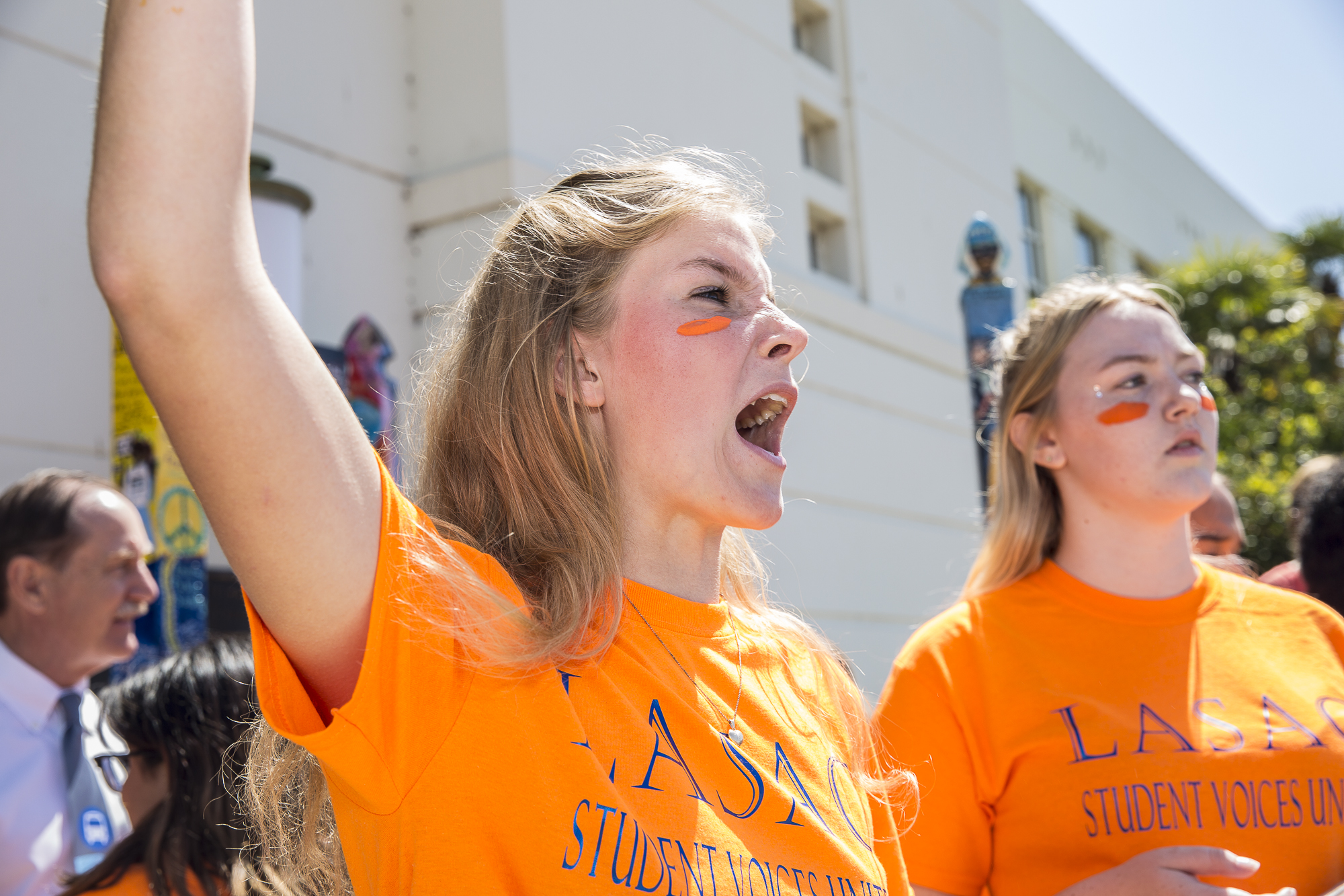 Santa Monica High students Siri Storstein (left) and Camille Hannant (right) start chanting during the student walkout that converged at Santa Monica City Hall in Santa Monica California, on Friday, April 20 2018. Several hundred students from area high schools and middle schools converged on Santa Monica City Hall in protest against all forms of gun violence, marking also the 19th anniversary of the Columbine High School massacre. (Matthew Martin/Corsair Photo)