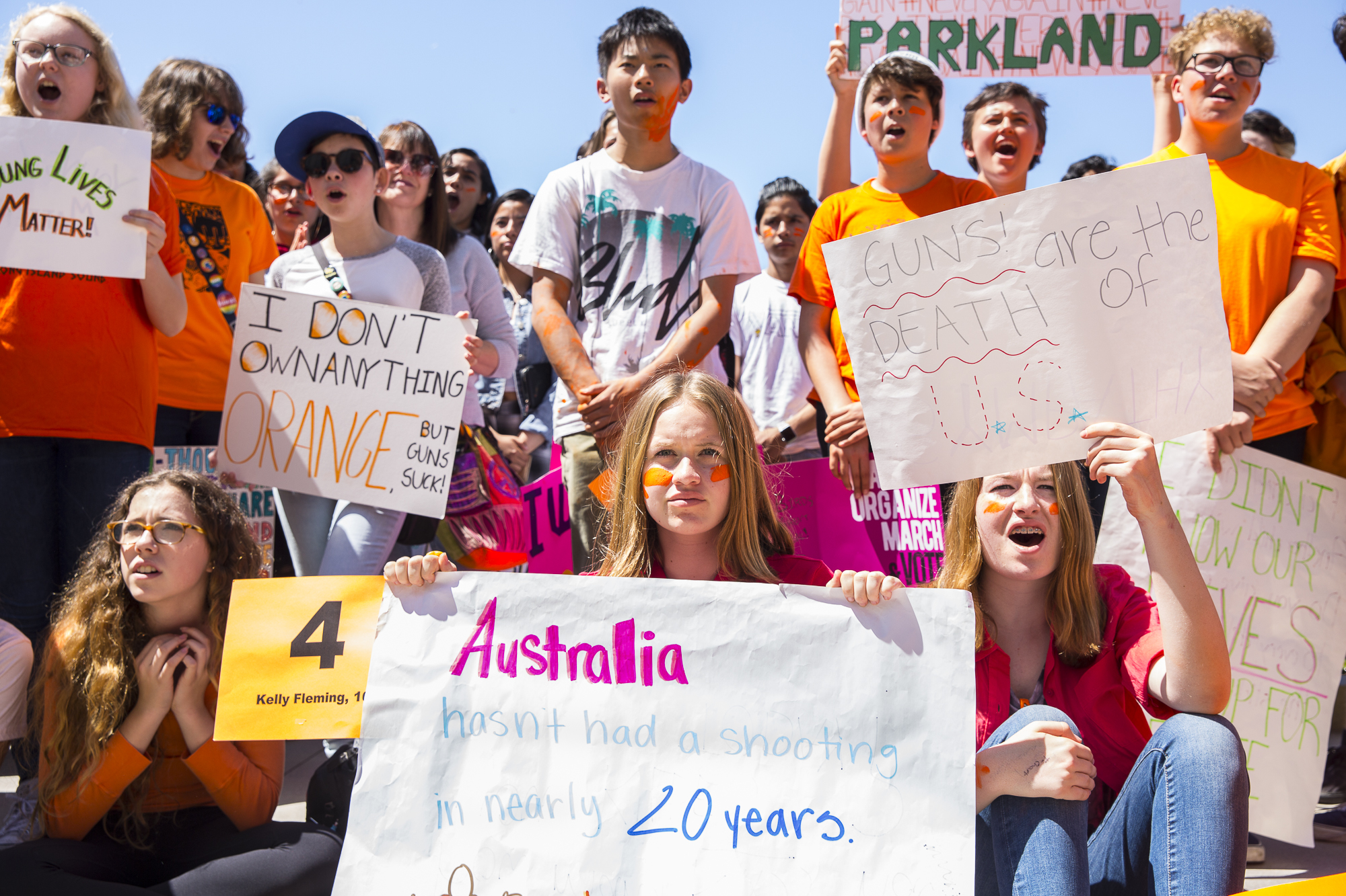 Young student activists from neighboring Santa Monica Middle Schools and High Schools hold up signs that express a desire for gun regulation while listening to key speakers during a student walkout that converged at Santa Monica City Hall in Santa Monica, California on Friday, April 20 2018. The student walkout marked the 19th anniversary of the Columbine High School massacre shooting and walkouts took place across the country so students could express their desire for a change in gun legislation. (Matthew Martin/Corsair Photo)