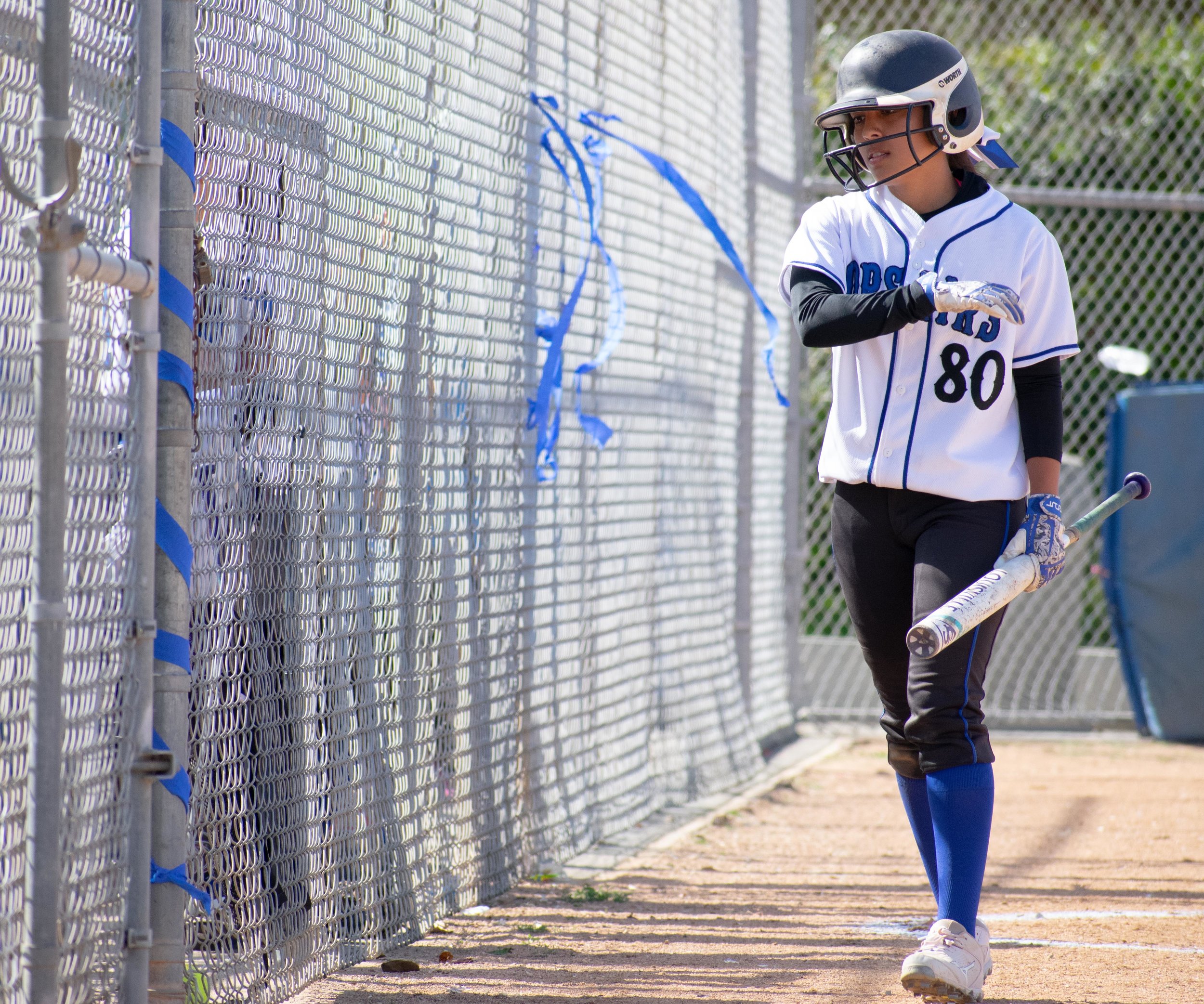 Santa Monica College Corsair Emma Soto (#80) walks to the dugout during the final game of the season against the Santa Barbara Vaqueros on Friday, April 20, 2018 at the John Adams Middle School Field in Santa Monica, California. The game was a 7-1 loss for the Corsairs, ending the season with an 8-21 record. (Ethan Lauren/Corsair Photo)