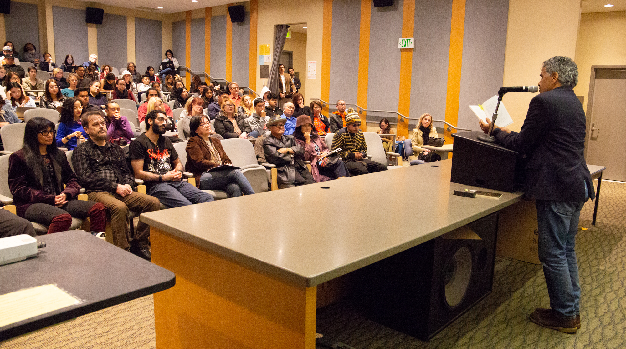  Mario Padillo reads from his work at the "Modern Poetic Permutations" event held at Santa Monica College, Santa Monica, California on Thursday April 19 2018. on Thursday April 19 2018. (Ruth Iorio/ Corsair Photo) 