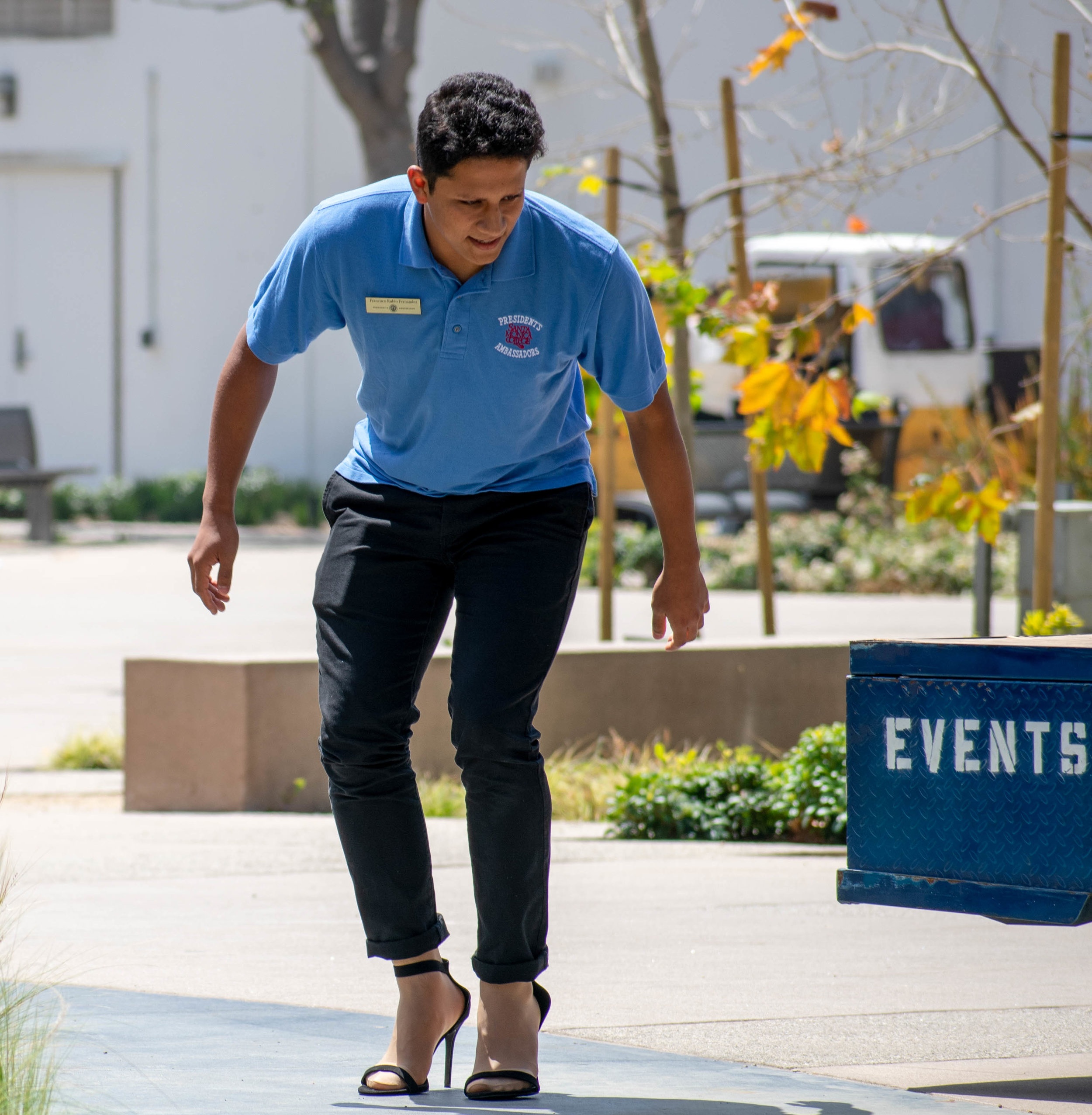  Francisco Rubio Hernandez puts on high heels to march at Santa Monica College in solidarity for women during an event regarding sexual awareness at Santa Monica College on Tuesday, April 24 in Santa Monica, California and organizes high heels. The d