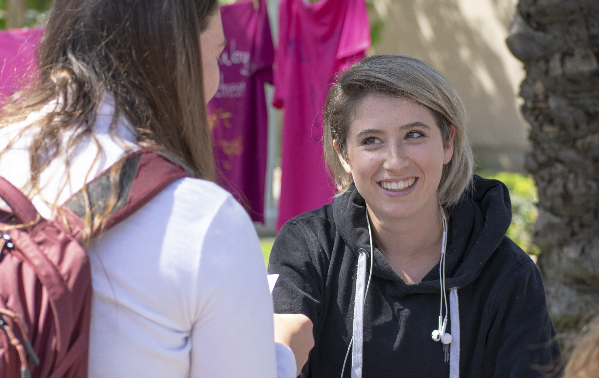 Sasha Shabasov represents Quick Yoga, a club on campus during Club Row on Thursday, April 26, 2018 at Santa Monica College in Santa Monica, California. With over 60 clubs in attendance, the day is meant to encourage clubs to showcase what they’ve been doing over the semester for students. (Ethan Lauren/Corsair Photo)