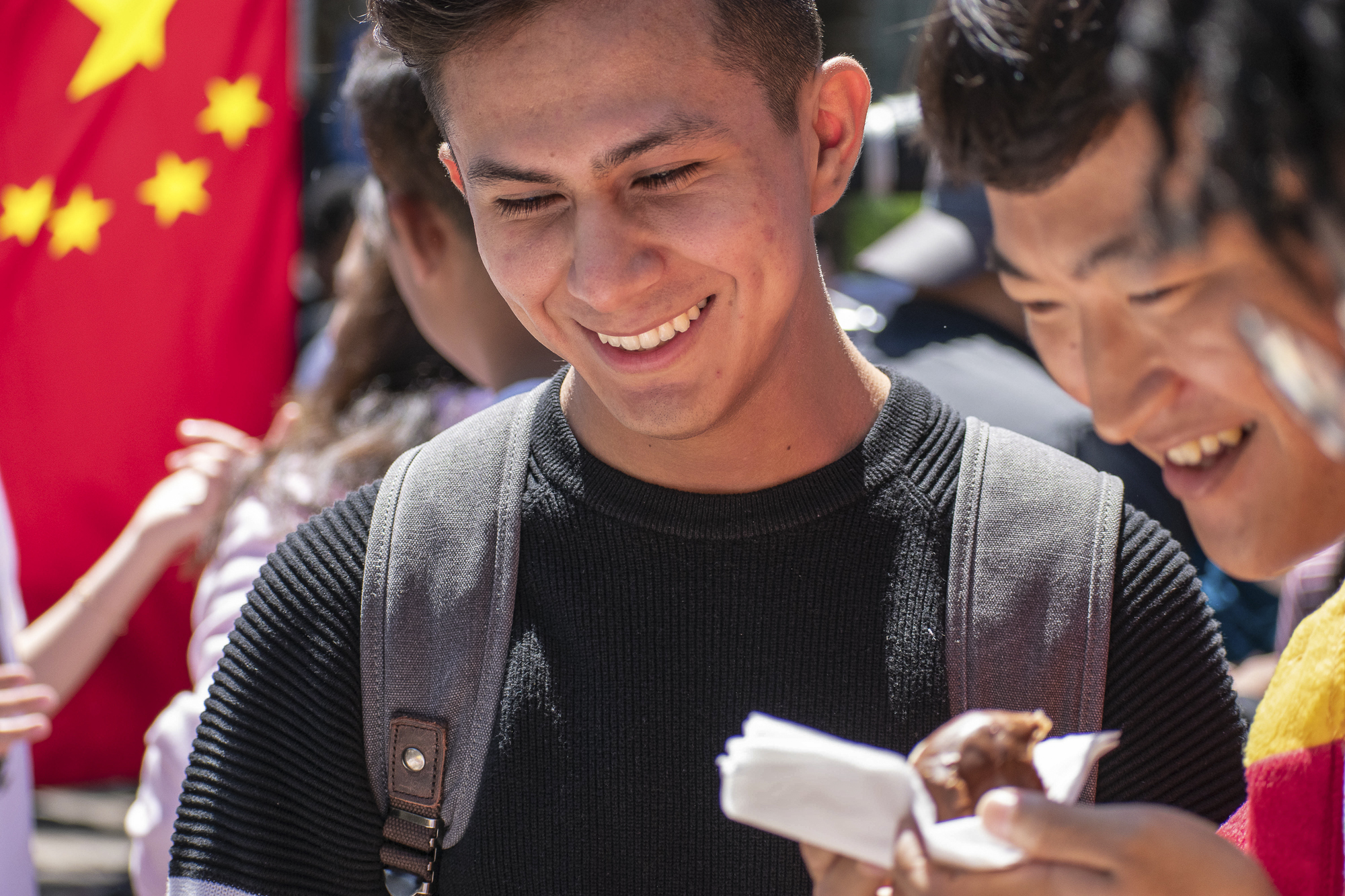 On the quad at Santa Monica College, Daniel Garcia visits the Asian Culture Exchange Association during Club Row on Thursday, April 26, 2018 in Santa Monica, California. With over 60 clubs in attendance, the day is meant to encourage clubs to showcase what they’ve been doing over the semester for students. (Ethan Lauren/Corsair Photo)