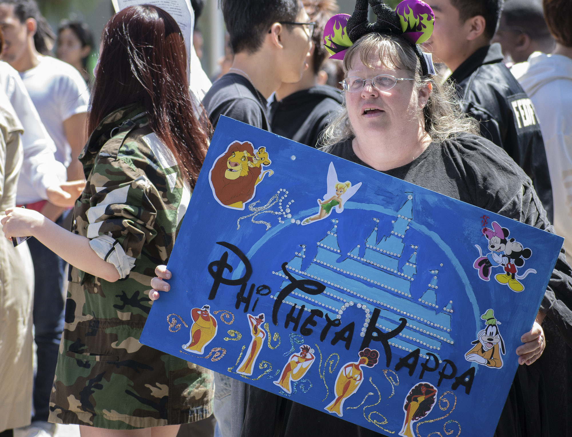 LeAnn Bogart advertises the honor society Phi Theta Kappa on campus during Club Row on Thursday, April 26, 2018 at Santa Monica College in Santa Monica, California. With over 60 clubs in attendance, the day is meant to encourage clubs to showcase what they’ve been doing over the semester for students. (Ethan Lauren/Corsair Photo)