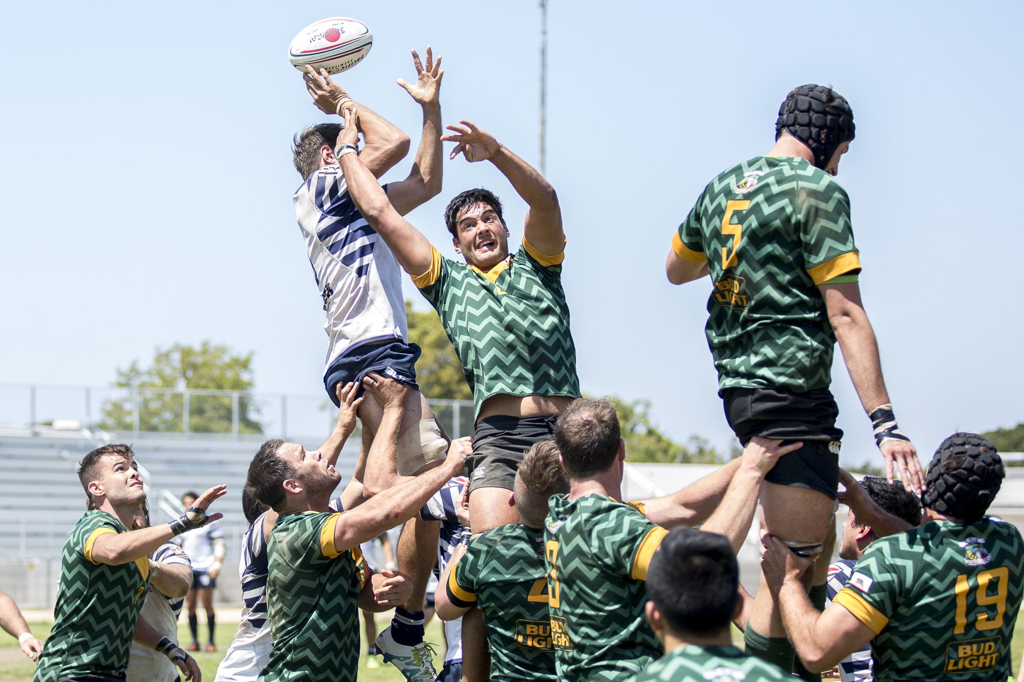  Santa Monica Dolphin Rugby forward Chris Allman #6 (center, green) fails to intercept the lineout throw while competing against Old Mission Beach Athletic Club (OMBAC), which was held at Westchester High School in Westchester California on Saturday 