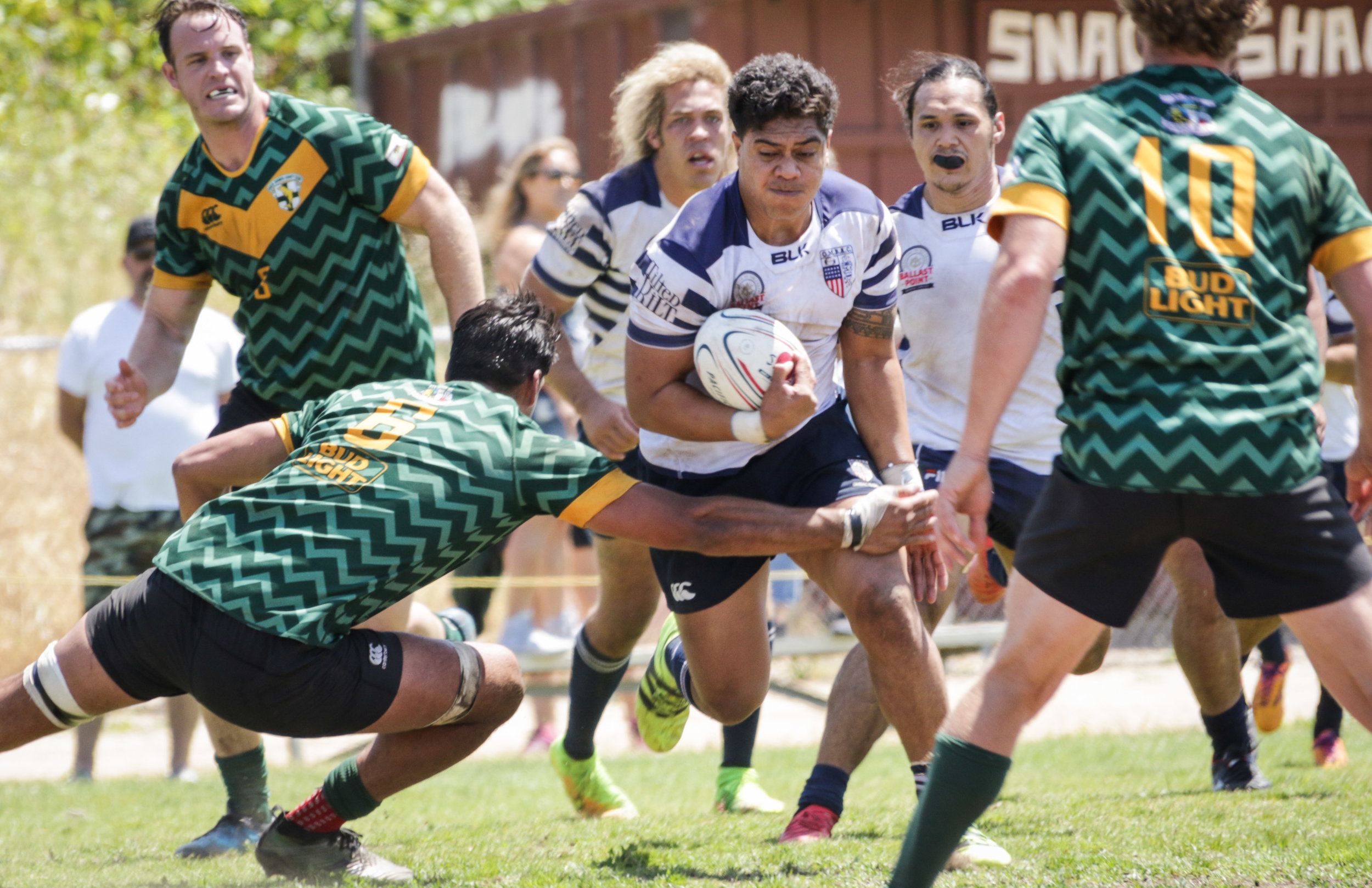  Old Mission Beach Athletic Club player tried to shrug off a tackle from Santa Monica Rugby player Chris Allman during their game held at Westchester High School on Saturday, April 28th, 2018. The game ended 26-7 in favor for OMBAC. (Westchester, Cal