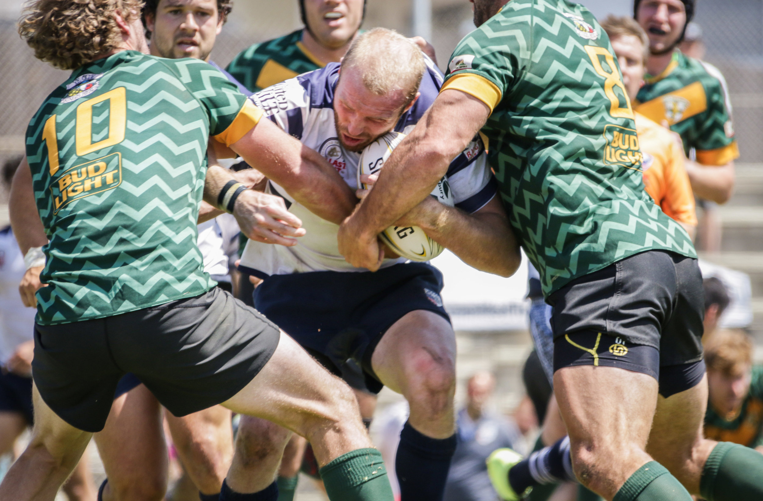  Old Mission Beach Athletic Club player gets tackled by multiple Santa Monica Rugby players during their game held at Westchester High School on Saturday, April 28th, 2018. The game ended 26-7 in favor for OMBAC. (Westchester, California, Saturday, A