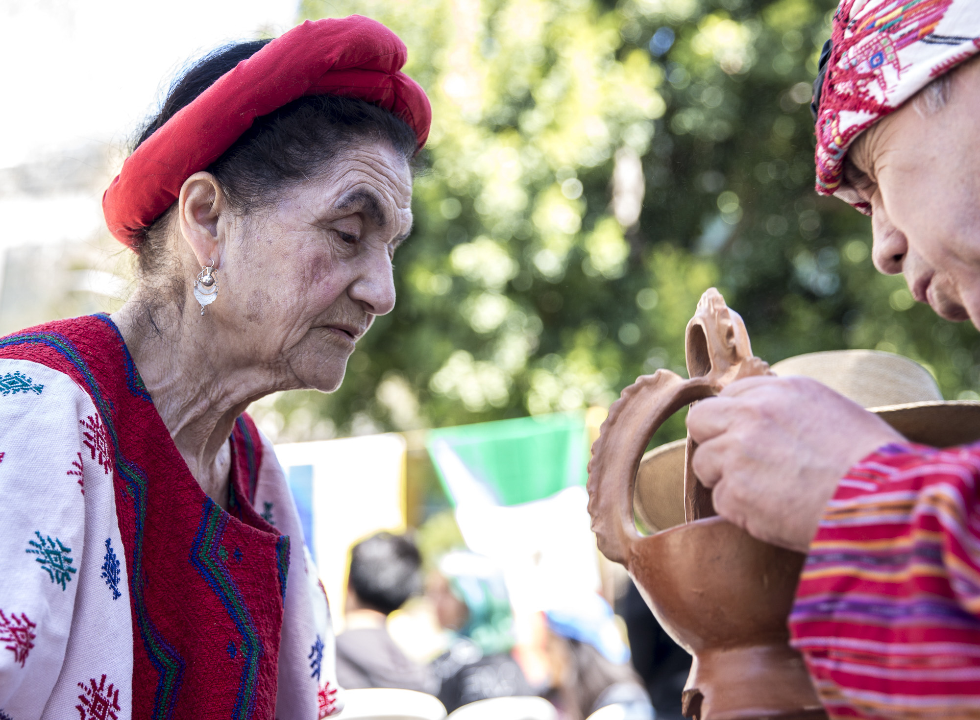  Evita Dubón (left) and Jorge Granja (right) prepare sage for the traditional Guatemalan dance they will be performing at the Santa Monica College (SMC) Cinco De Mayo celebration event in front of the clock tower on the SMC main campus on Thursday, M