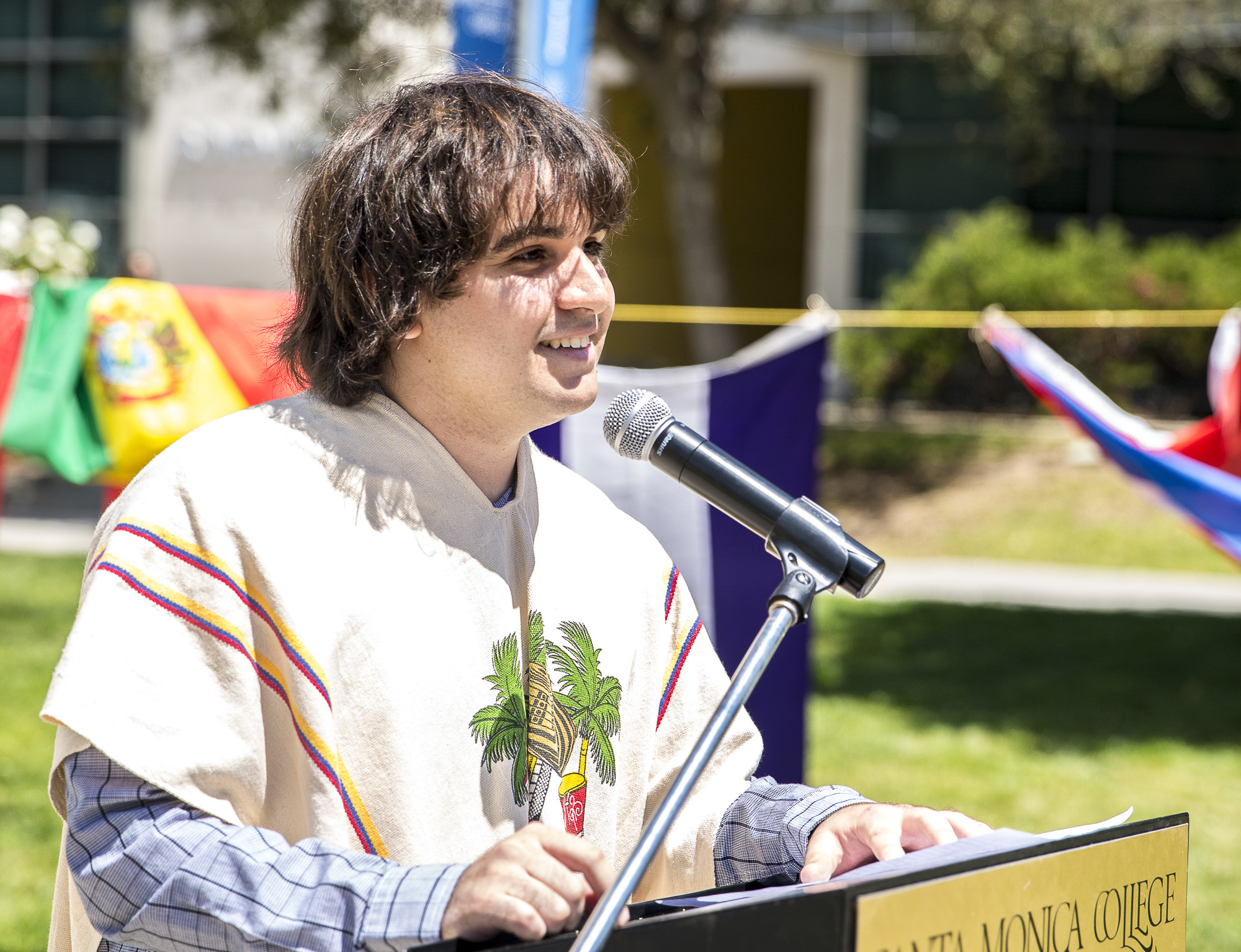  Santa Monica College (SMC) student and President of the club “Adelante” Joshua Barsky speaks to those in attendance on the importance of Cinco de Mayo and educating those that don’t understand its significance during the Santa Monica College Cinco D