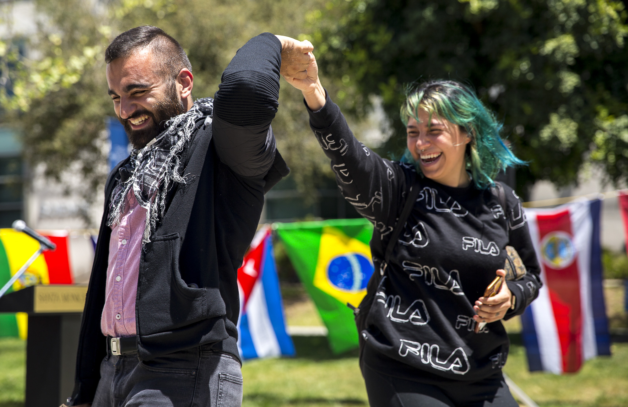  Associated Student Director of Student Advocacy Alexa Benavente (right) dances with newly elected Associated Student Vice President Hesham Jarmakani (left) during the Cinco de Mayo Celebratory event organized by Santa Monica College club (SMC) “Adel