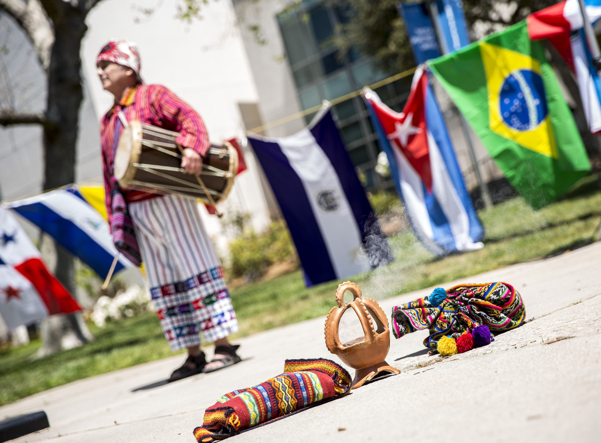  A shot of Jorge Granja  who is apart of the group “Folklore: Mi Bella Guatemala” prepares to begin a traditional Guatemalan dance for those attending the Santa Monica College (SMC) Cinco De Mayo celebration event in front of the clock tower on the S