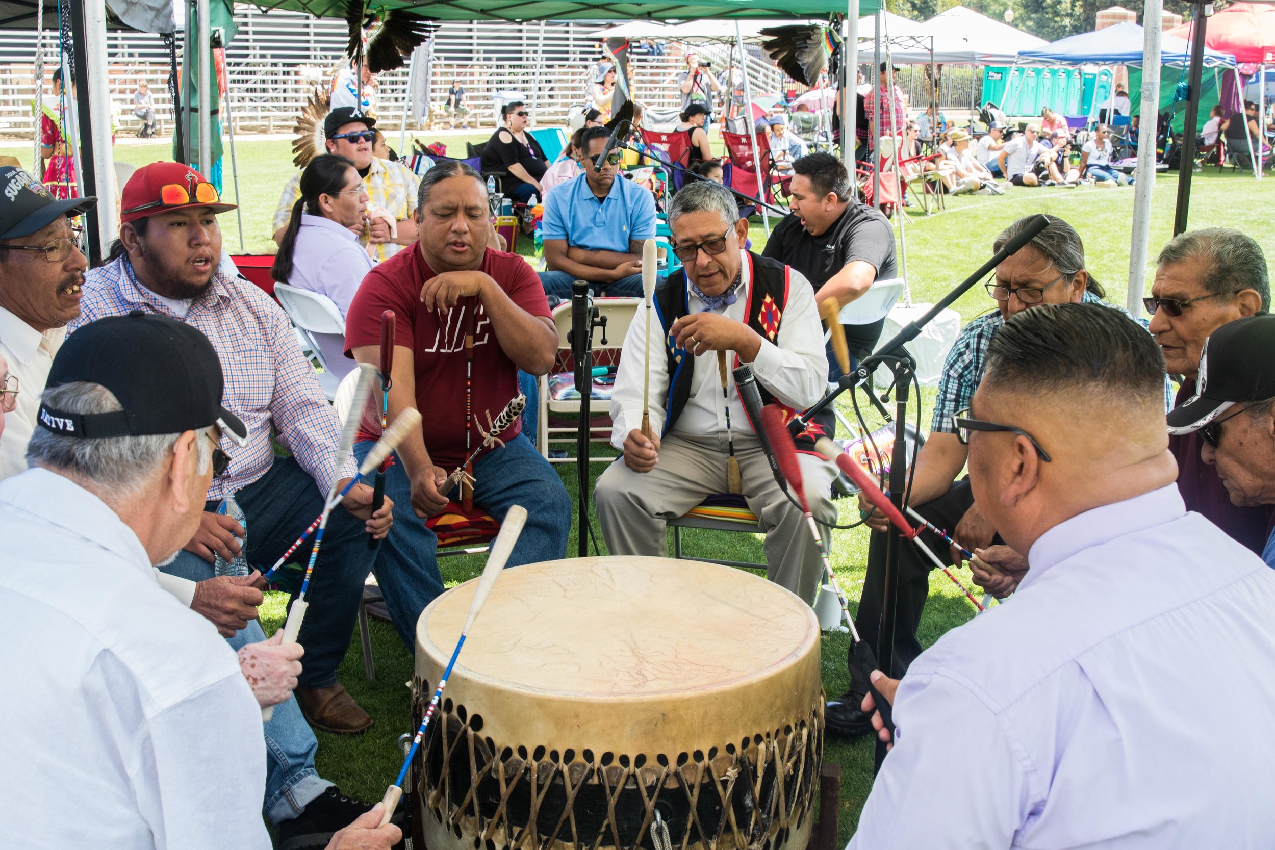  Members of various Indigenous tribes join together to play the drums for one of the numerous dance routines at the thirty-third annual UCLA Pow-Wow. Drums and dancing are used to give thanks and pay respect to The Creator in many Indigenous Cultures