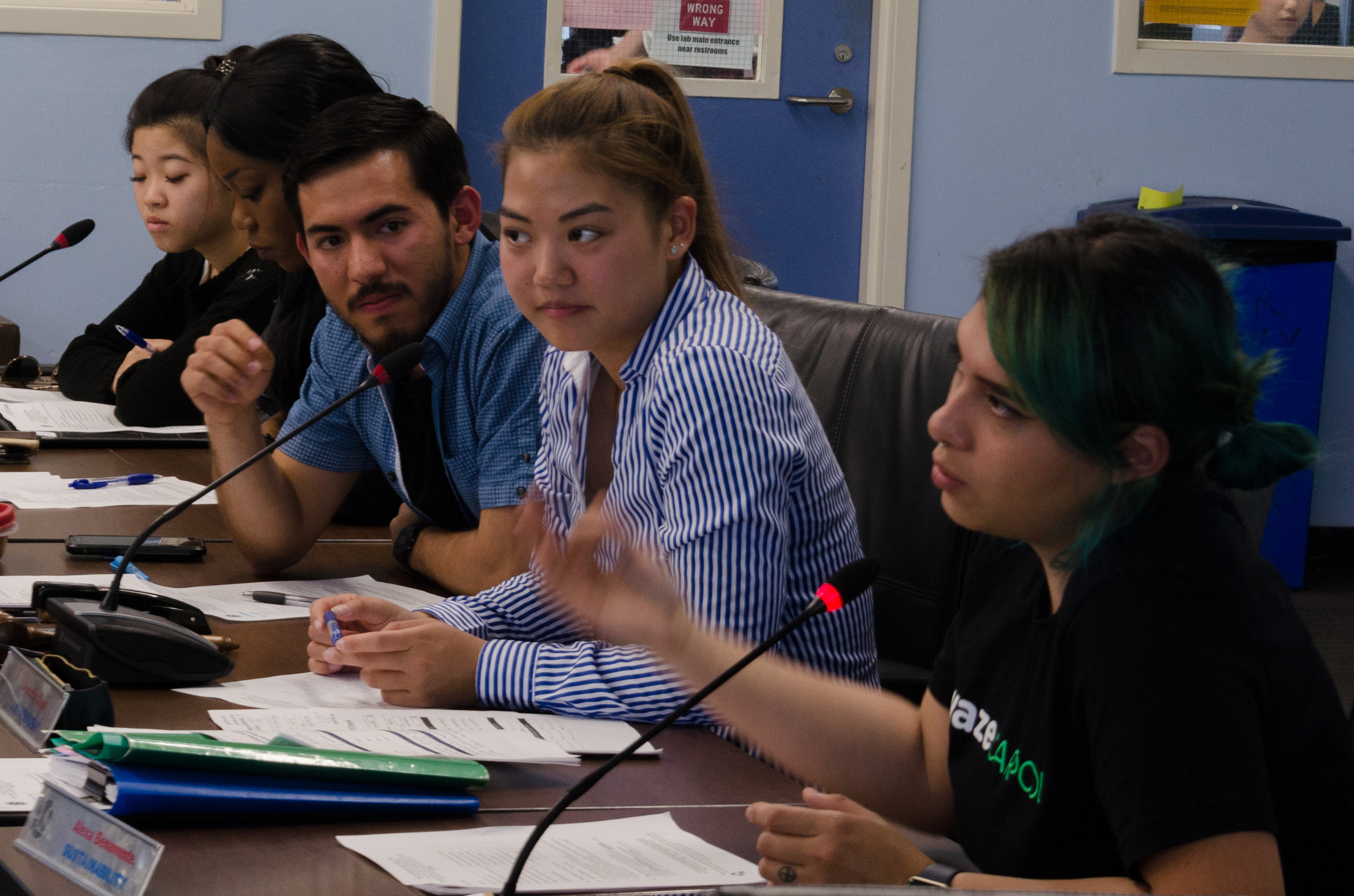 At the May 7th meeting of Associated Students in the Cayton Center in Santa Monica College in Santa Monica, California, Sustainability Director Alexa Benavente asks questions regarding a proposal to spend twenty thousand dollars for second year's subscription to LIVE SAFE, an app which allows students to report suspicious incidents they see on campus.(Reed Curtis-CorsairPhoto)