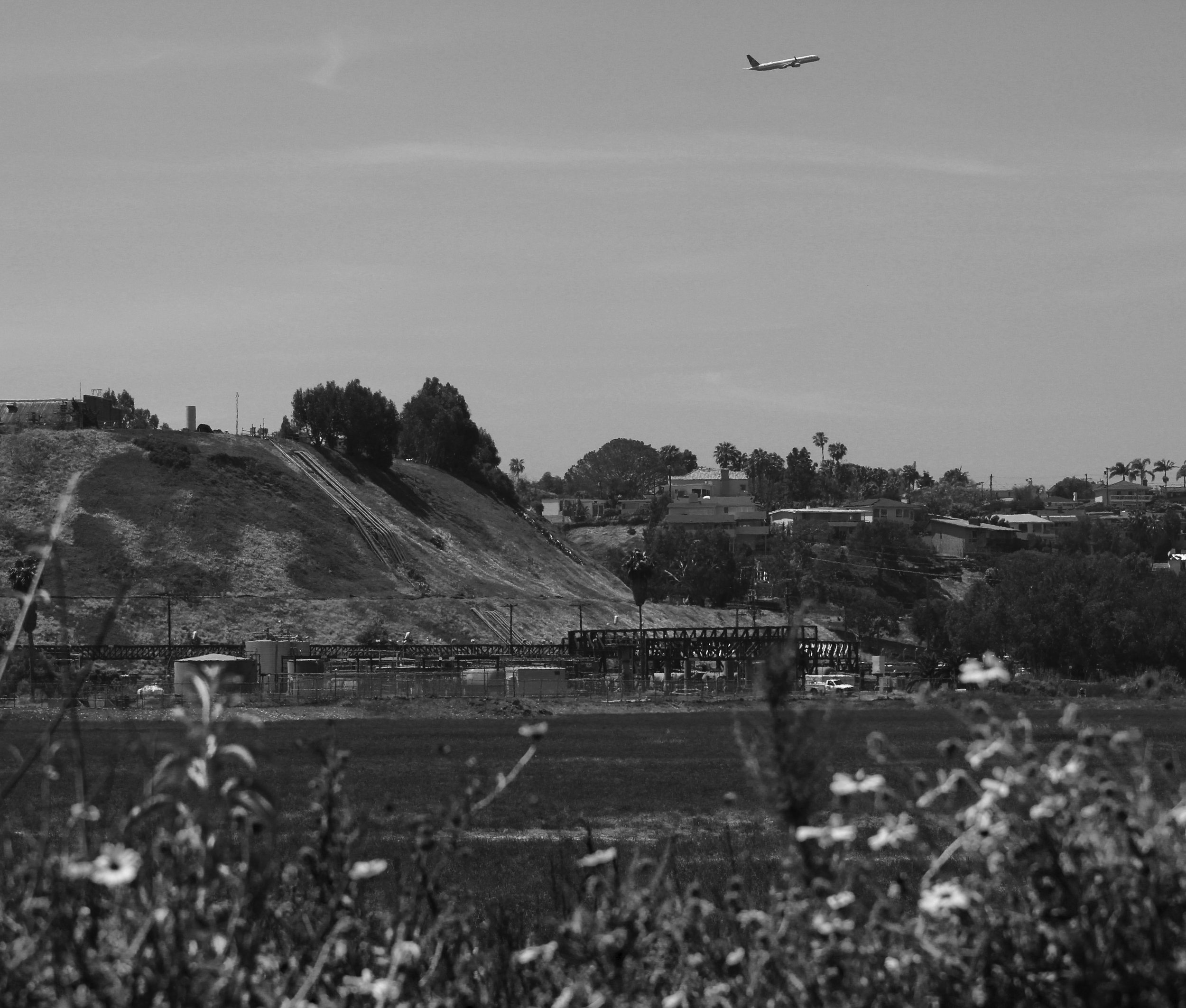 The SoCalGas storage facility in Playa del Rey sits at the bottom of a hill where mansions look down at it, while also placed amongst the marshes of the Ballona Wetlands Ecological Reserve on Saturday, May 5, 2018. (Pyper Witt/ the Corsair)