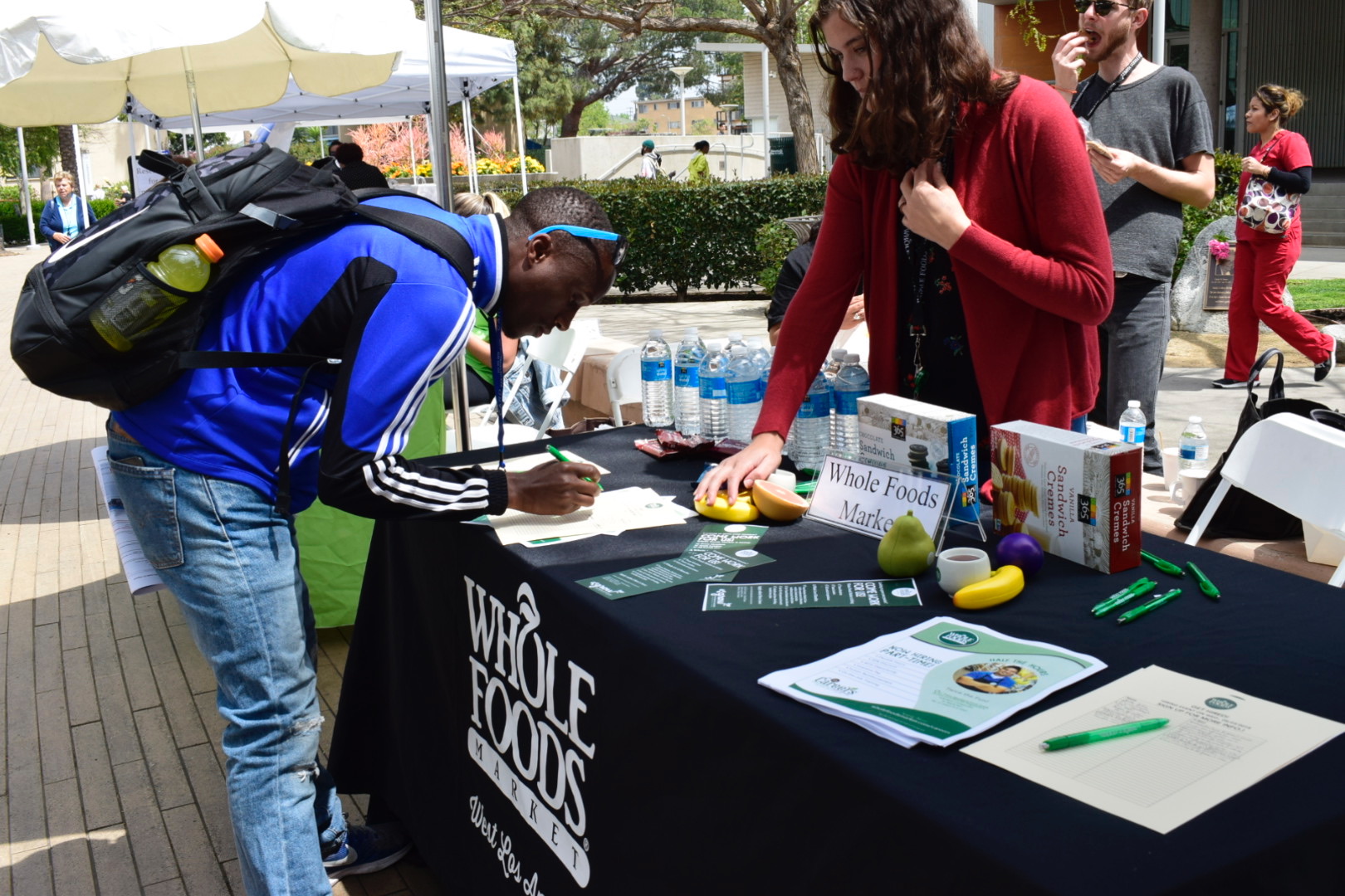  A Santa Monica College student signing up to get more information on job opportunities at Whole Foods during the Job Fair at Santa Monica College on May 8, 2018 in Santa Monica, Calif. (Claudia Vardoni/ Corsair Photo) 