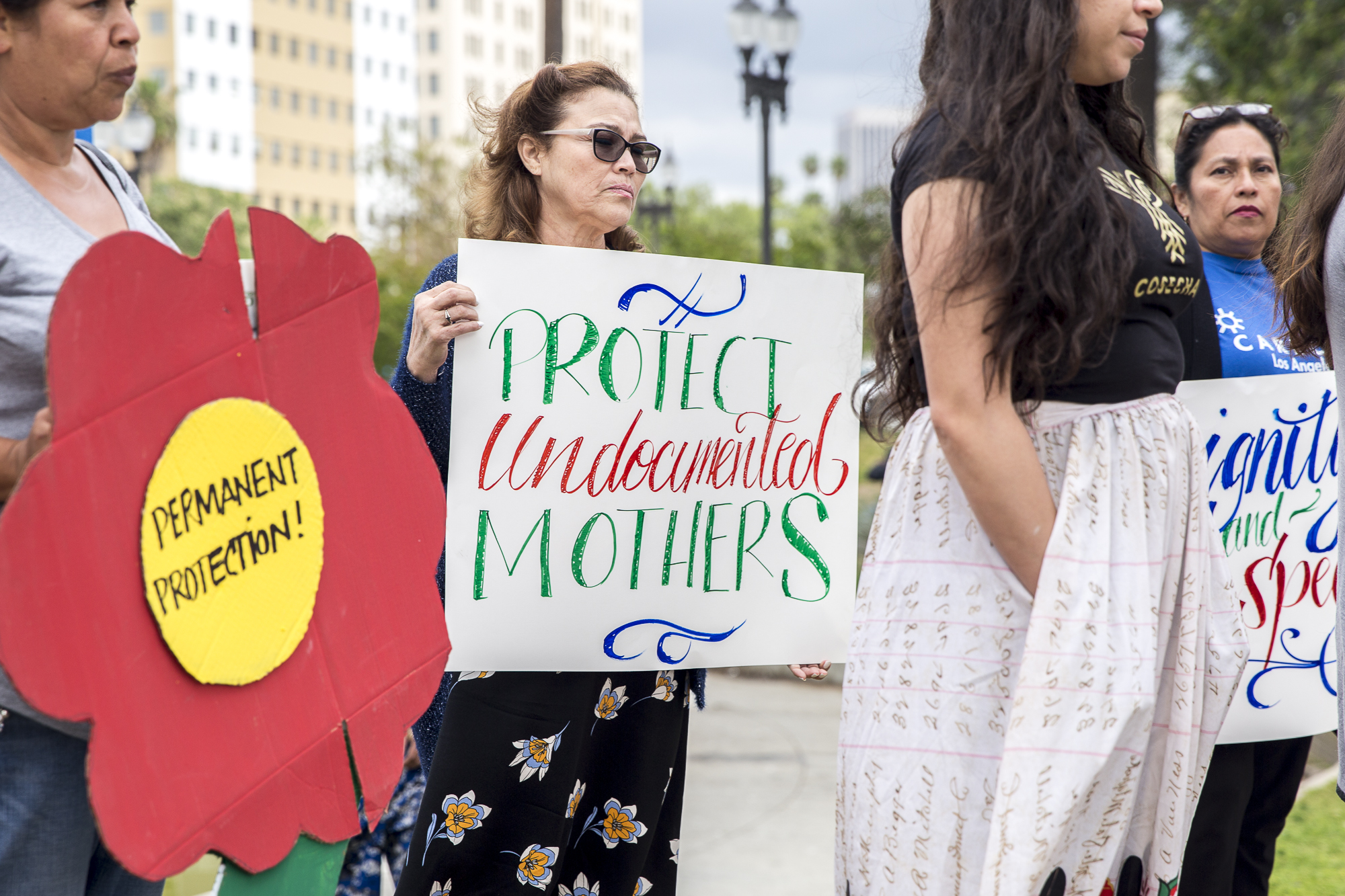  On the eve of Mother's Day, a group of undocumented immigrant mothers gather in MacArthur Park to protest against the Trump administration's hardline immigration policies in Los Angeles, California on Saturday, May 12 2018. The rally, organized by i