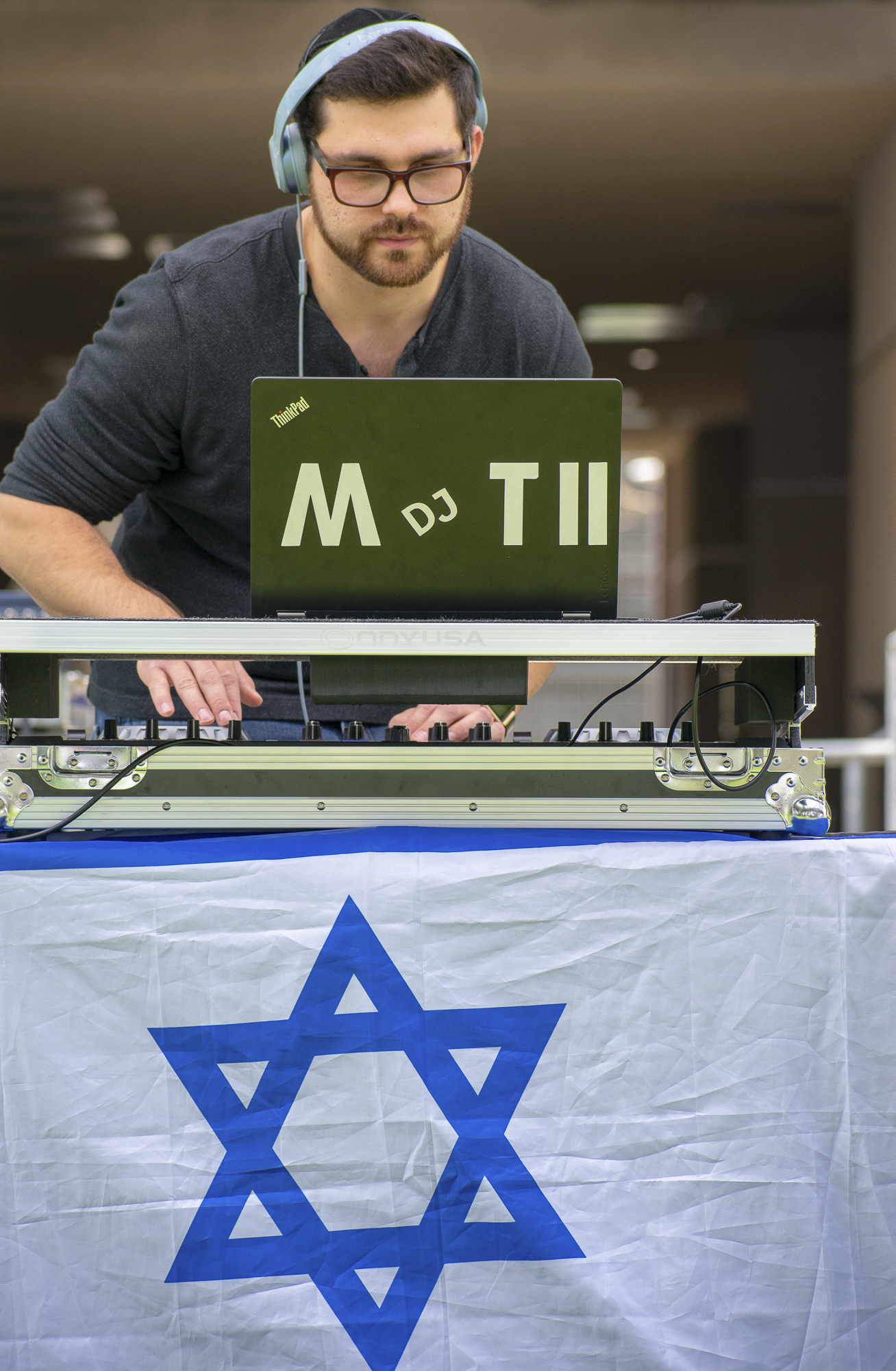  DJ Moti, otherwise known as David Leibman, a student at Santa Monica College, plays Israeli music during an event put on by the Students Supporting Israel club at Santa Monica College on Thursday, May 10 in Santa Monica, California. The event was a 